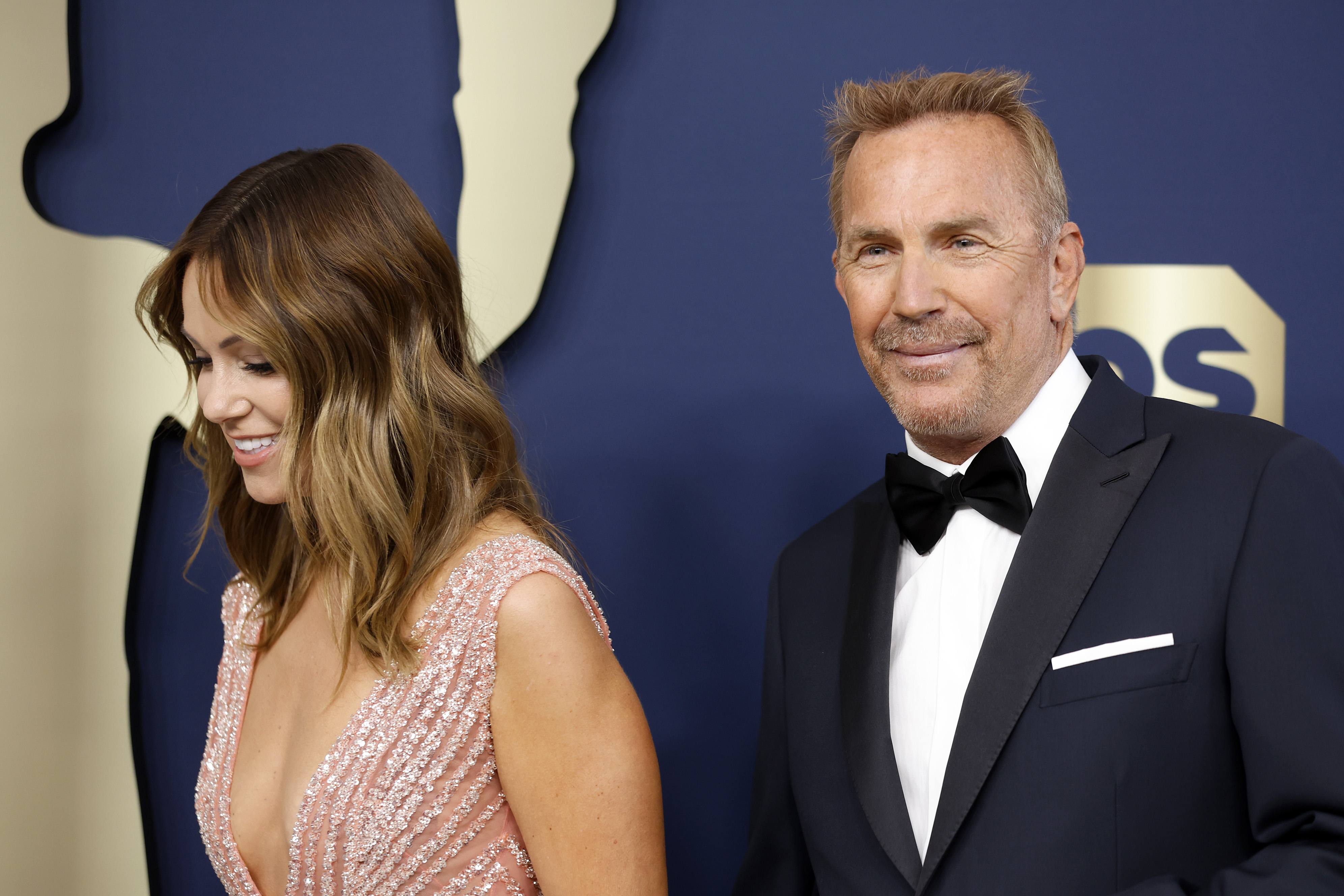 Christine Baumgartner and Kevin Costner at the 28th Annual Screen Actors Guild Awards on February 27, 2022, in Santa Monica, California | Source: Getty Images
