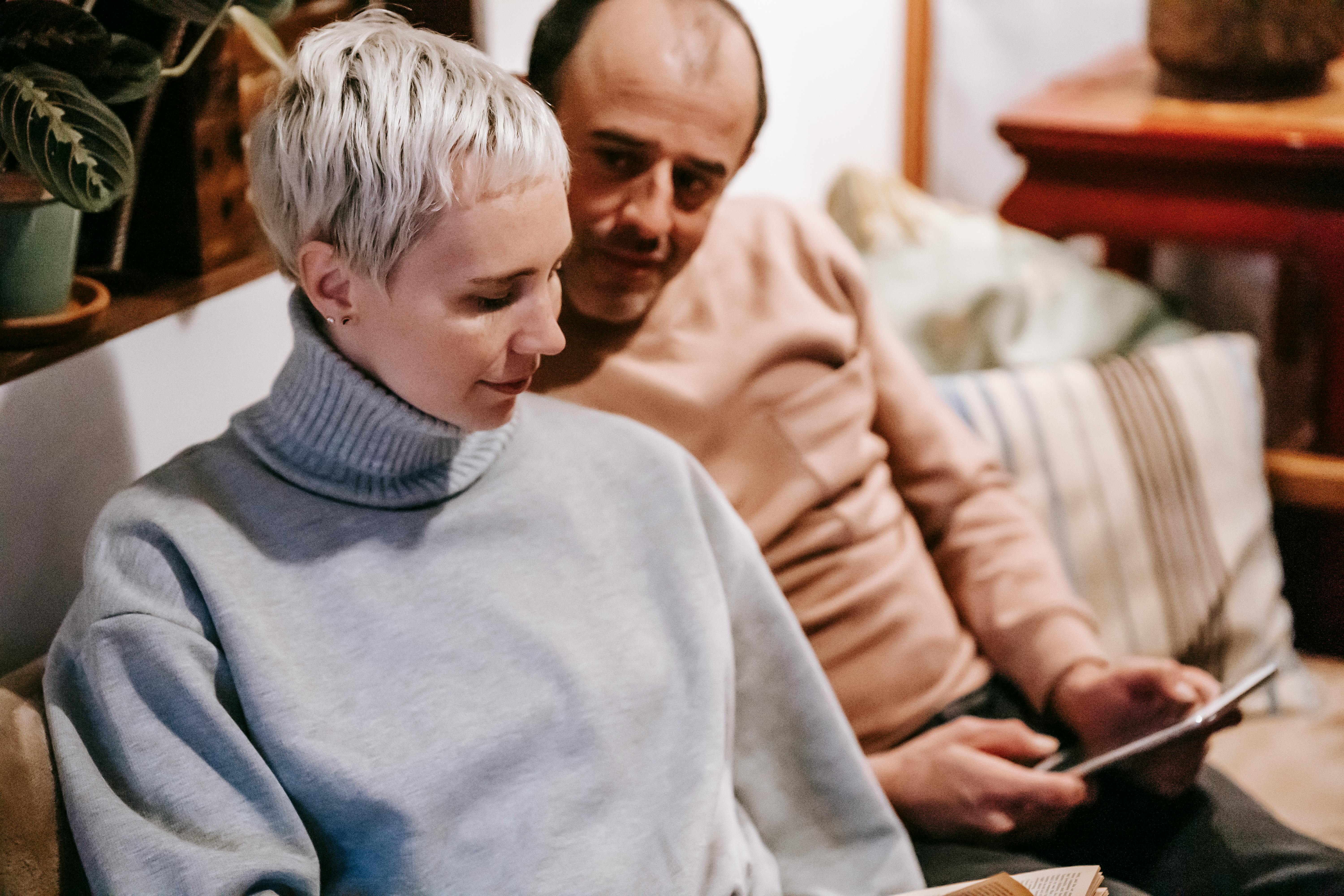 A couple talking to someone on a tablet | Source: Pexels