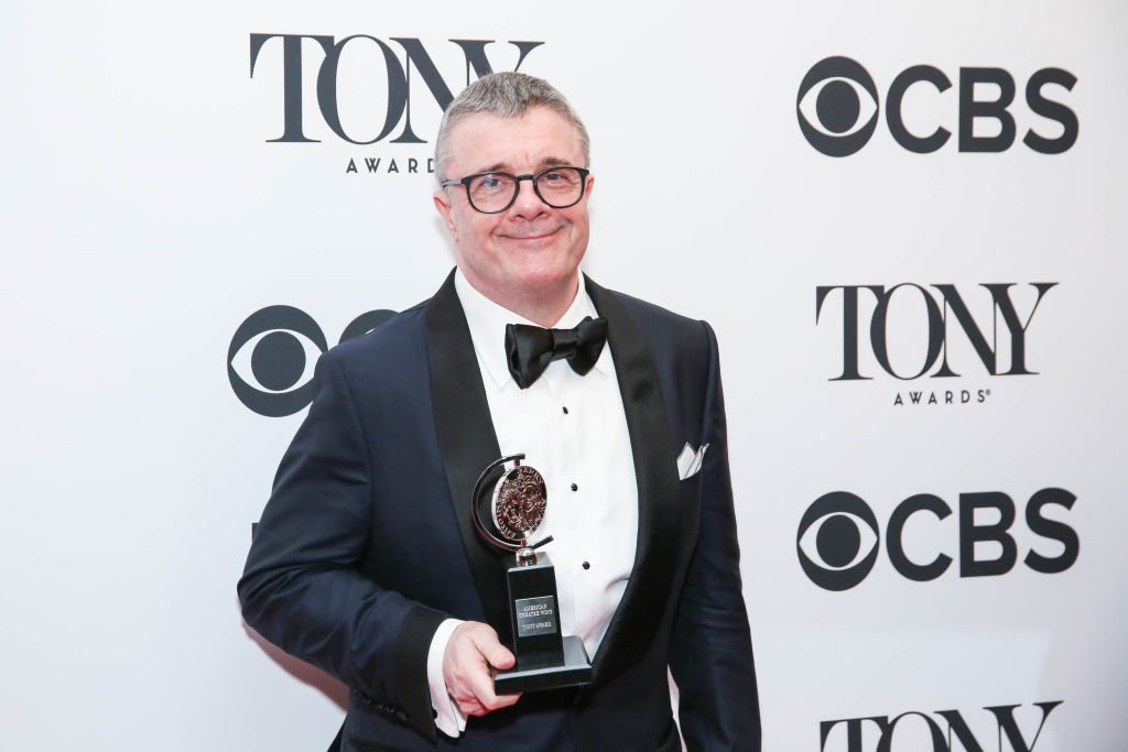 Nathan Lane poses with his award in the 72nd Annual Tony Awards Press Room at 3 West Club on June 10, 2018. | Photo: Getty Images