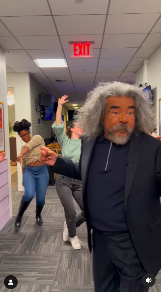 George Lopez dancing down the hallway as the staff sing and cheer for him. | Source: Instagram/jenniferhudsonshow