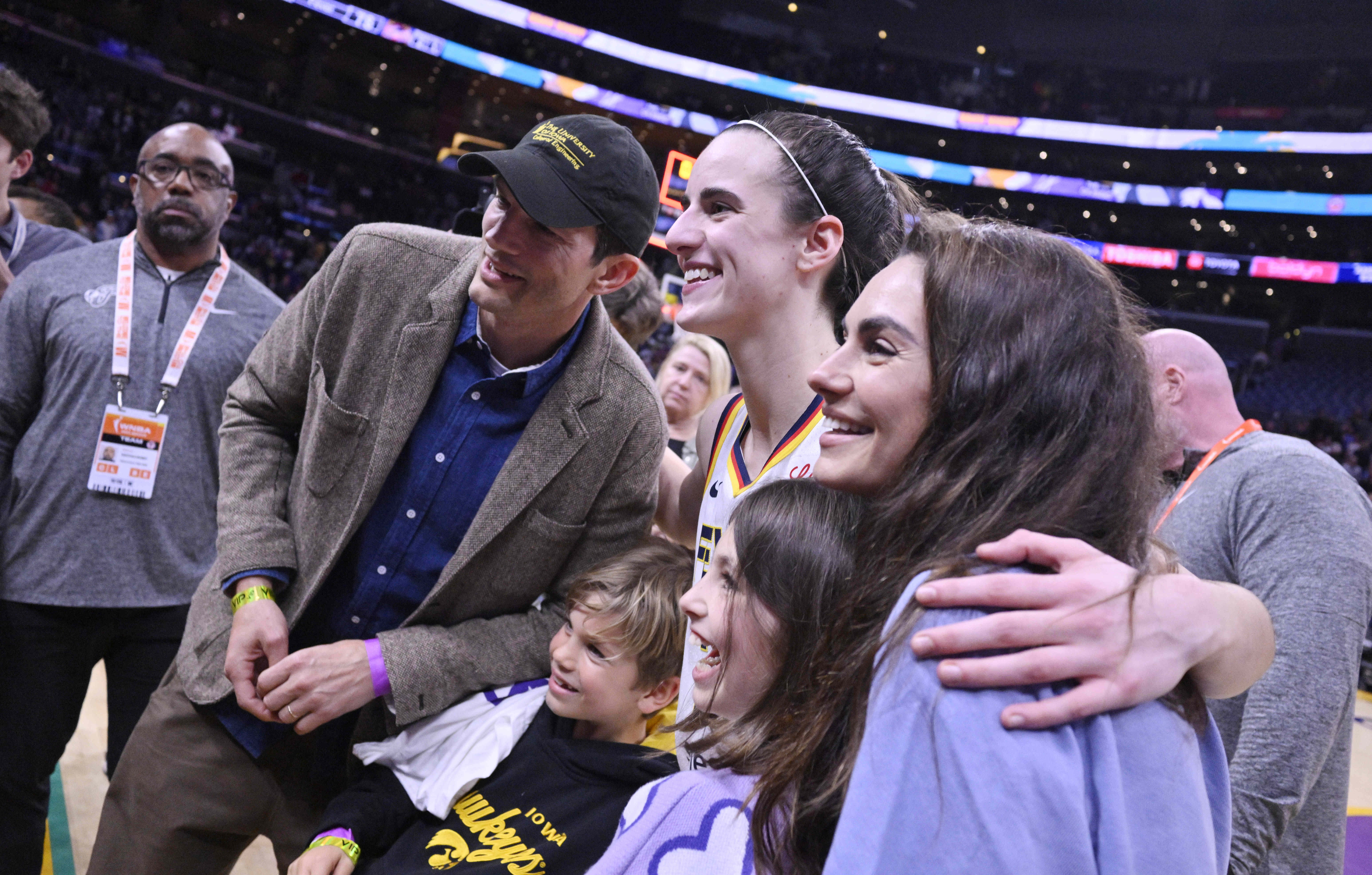 Caitlin Clark, Mila Kunis, Ashton Kutcher and their children, Wyatt and Dimitri, during the WNBA basketball game on May 24, 2024, at Crypto.com Arena in Los Angeles, California | Source: Getty Images