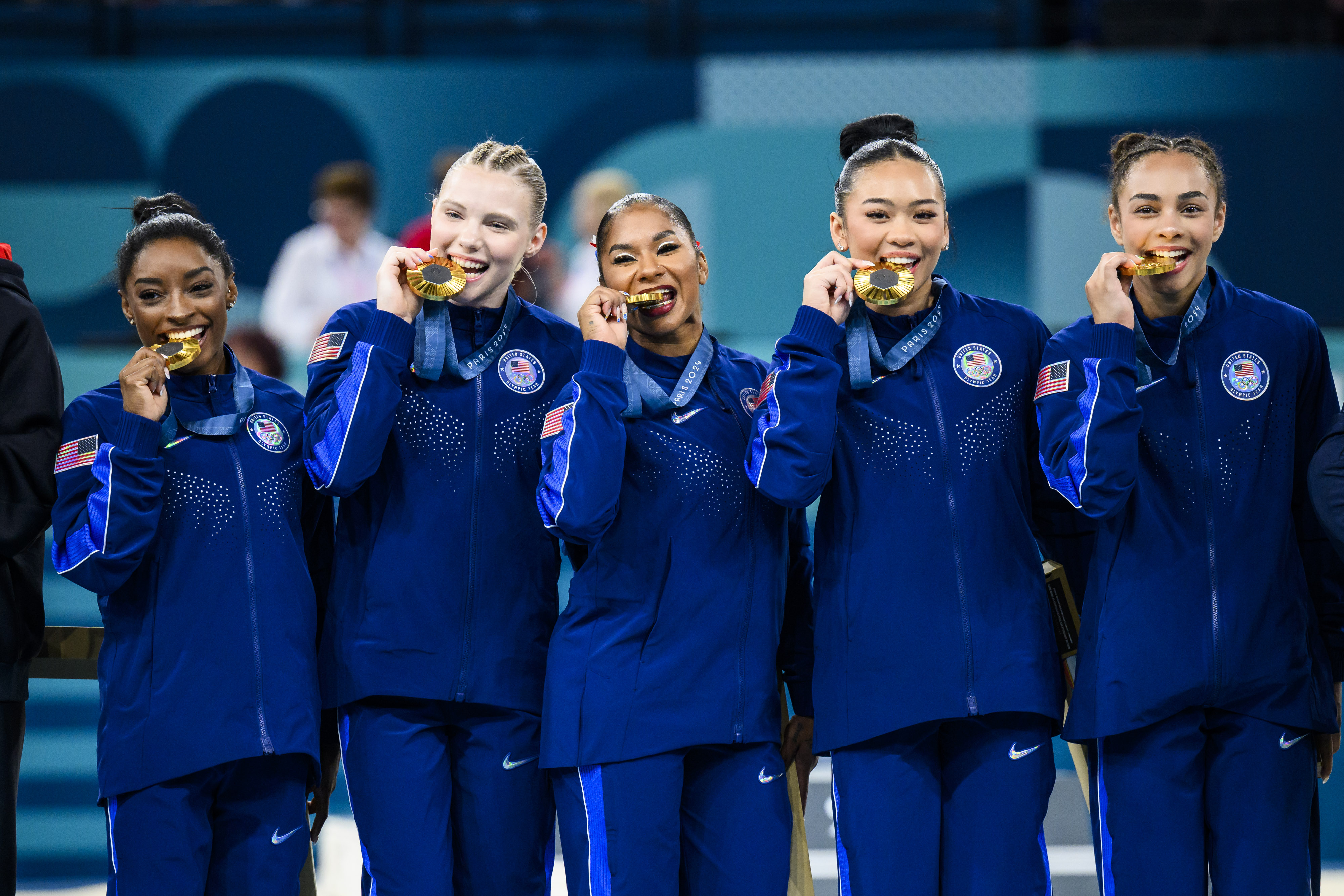 Simone Biles, Jade Carey, Jordan Chiles, Sunisa Lee, and Hezly Rivera of Team US celebrate winning the gold medal for the Artistic Gymnastics Women's Team Final at the Paris Olympic Games on July 30, 2024, in Paris, France | Source: GettyImages