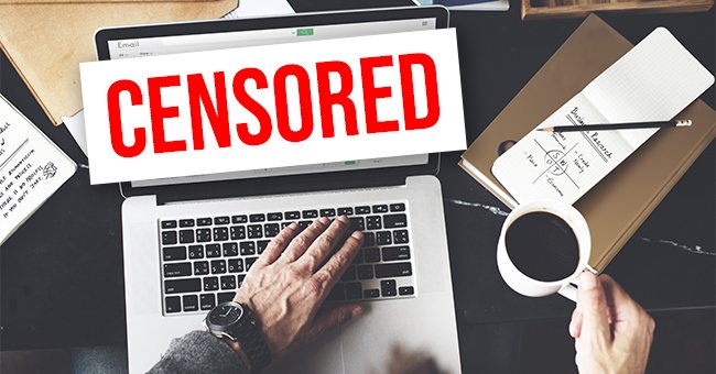 A photo a laptop with censored written across the screen | Photo: Shutterstock