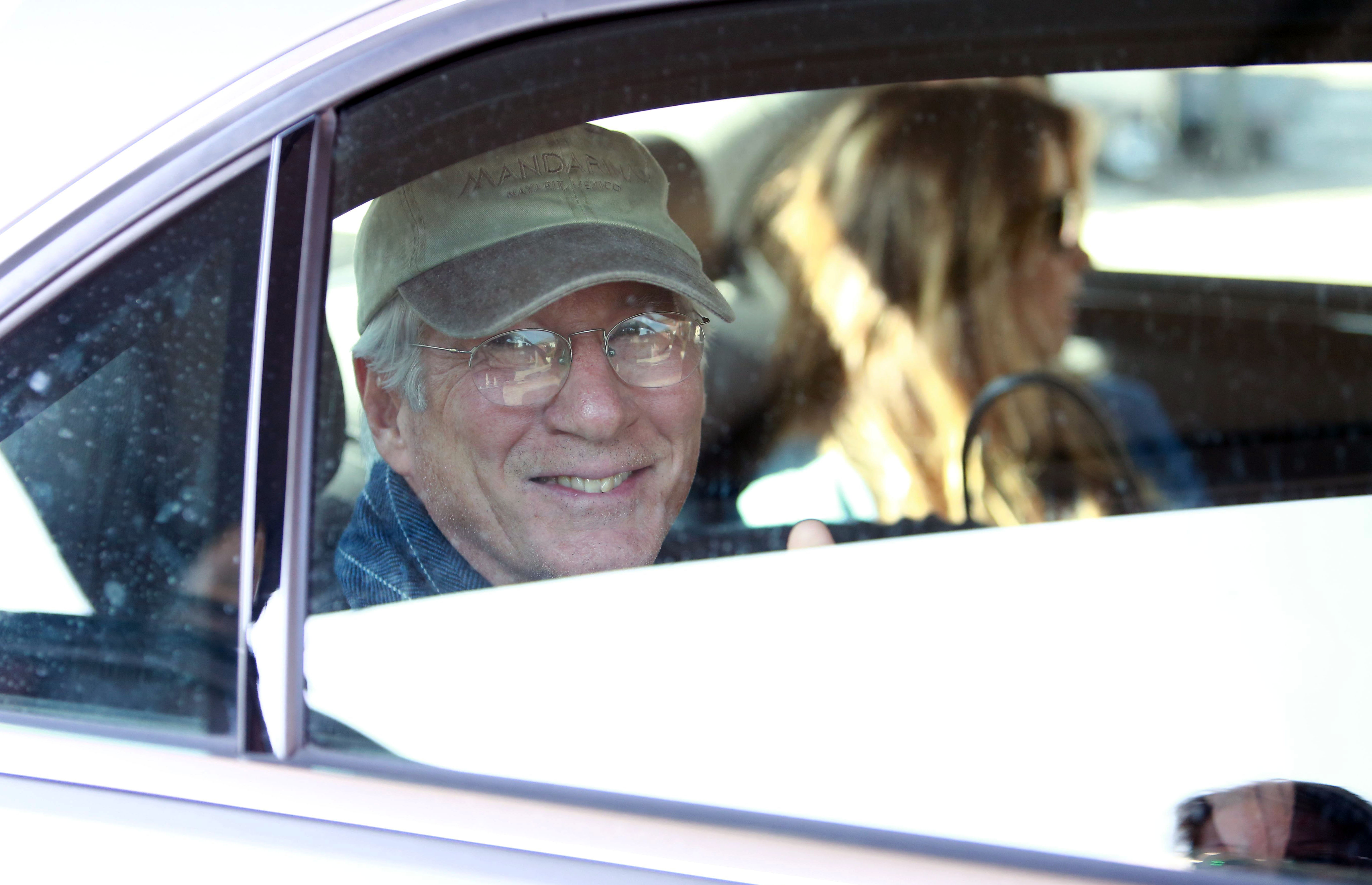 Richard Gere and his wife, Alejandra Silva, are seen inside a car on October 23, 2018, in Madrid, Spain. | Source: Getty Images