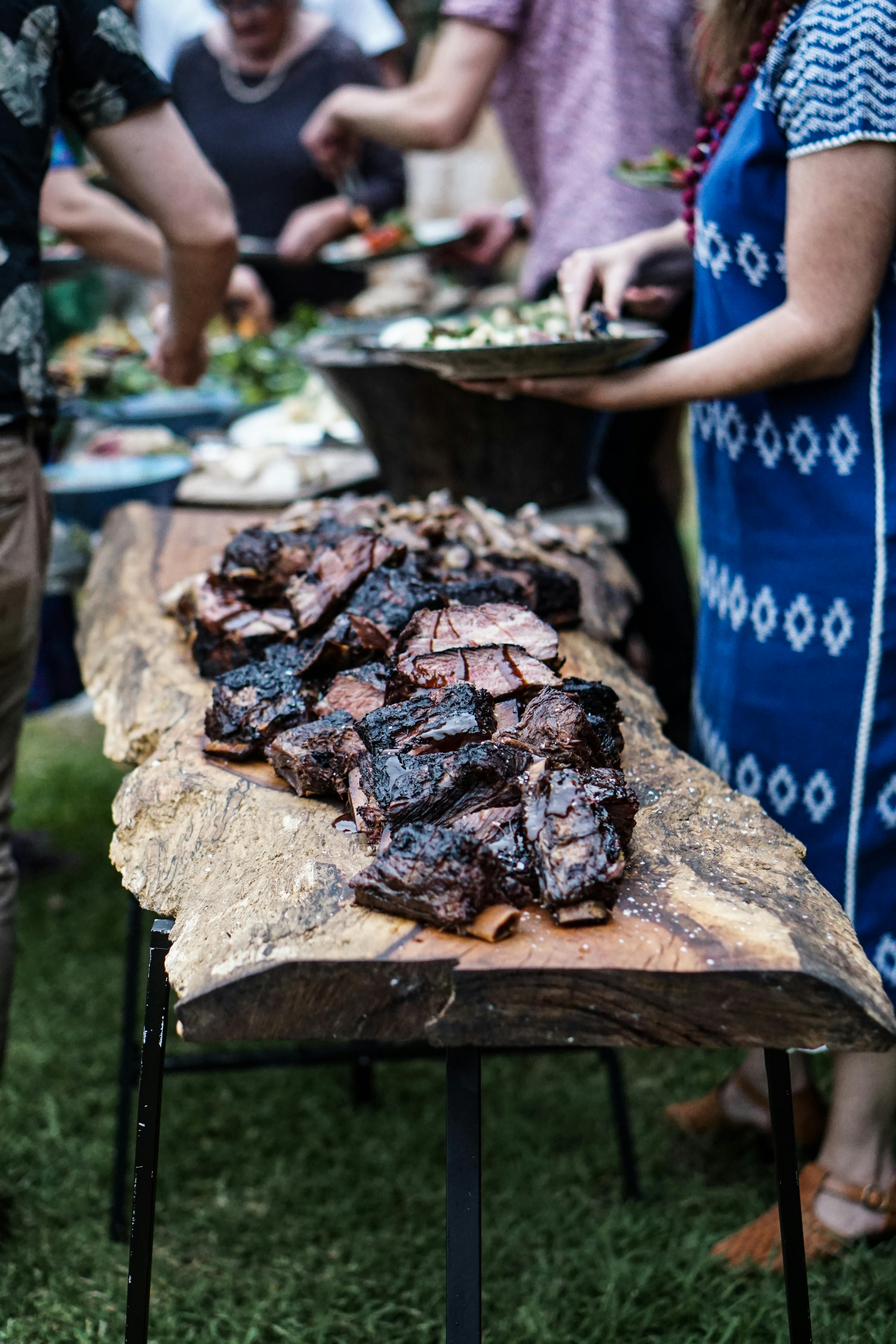 Family enjoying a barbecue | Source: Pexels