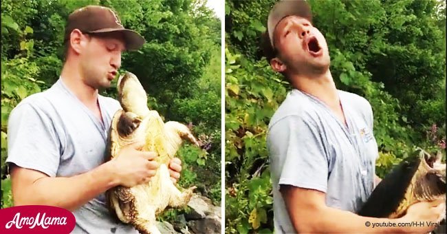 Man pulled a turtle out by the tail and tried to kiss it but gets bitten