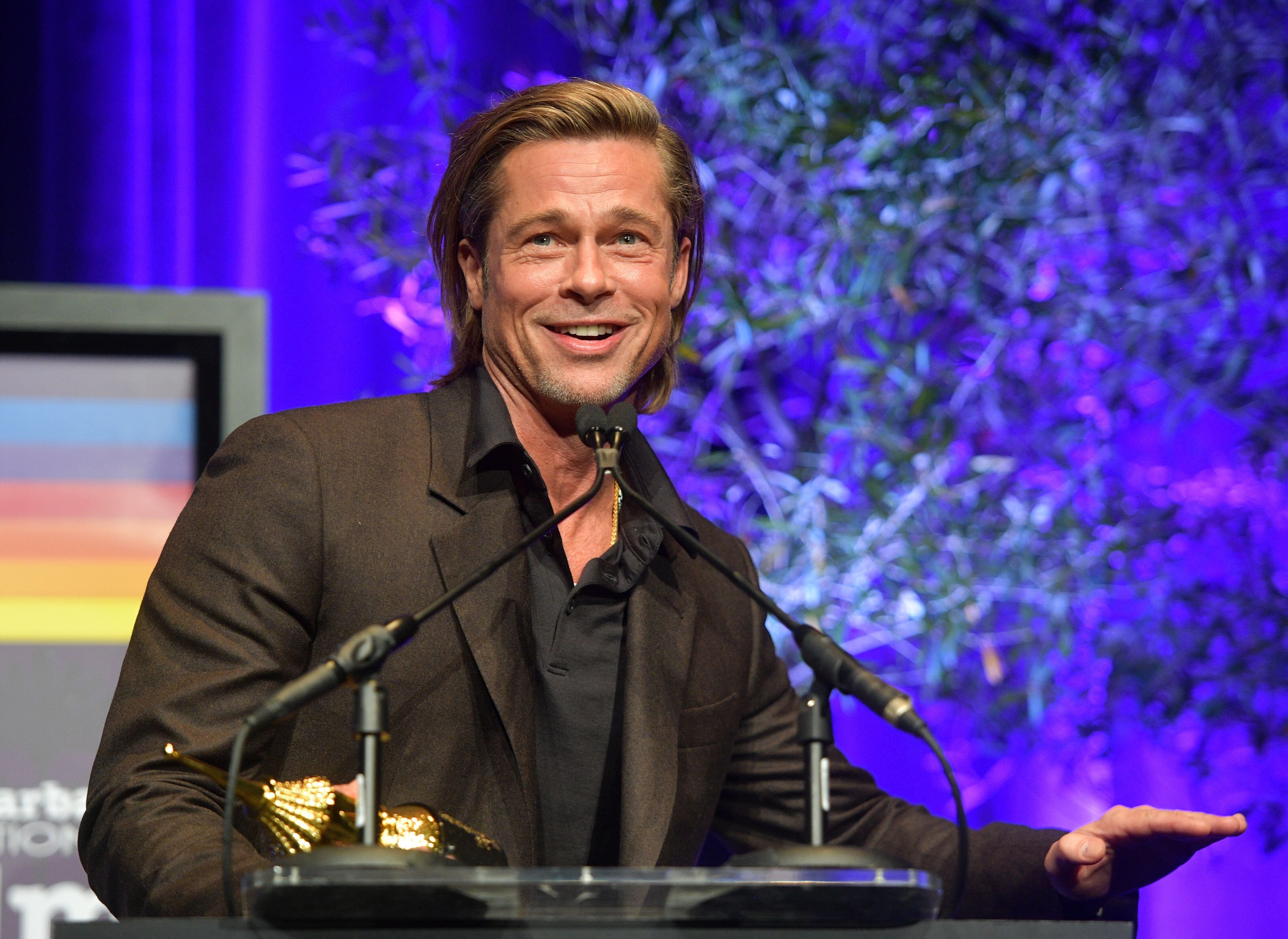 Brad Pitt accepts his SAG Award for "Once Upon a Time in Hollywood" | Source: Getty Images/GlobalImagesUkraine