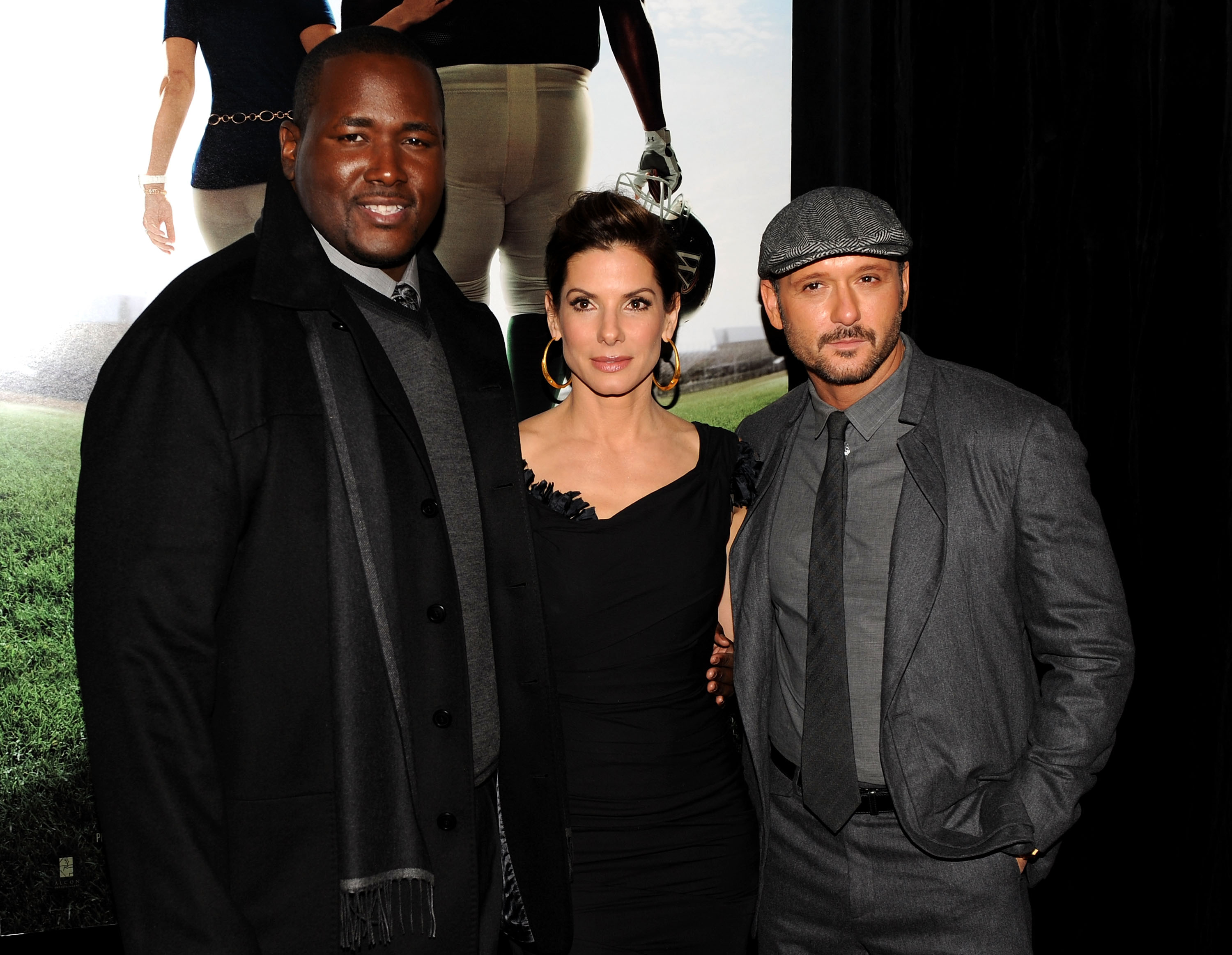 Quinton Aaron, Sandra Bullock, and Tim McGraw in New York City on November 17, 2009 | Source: Getty Images
