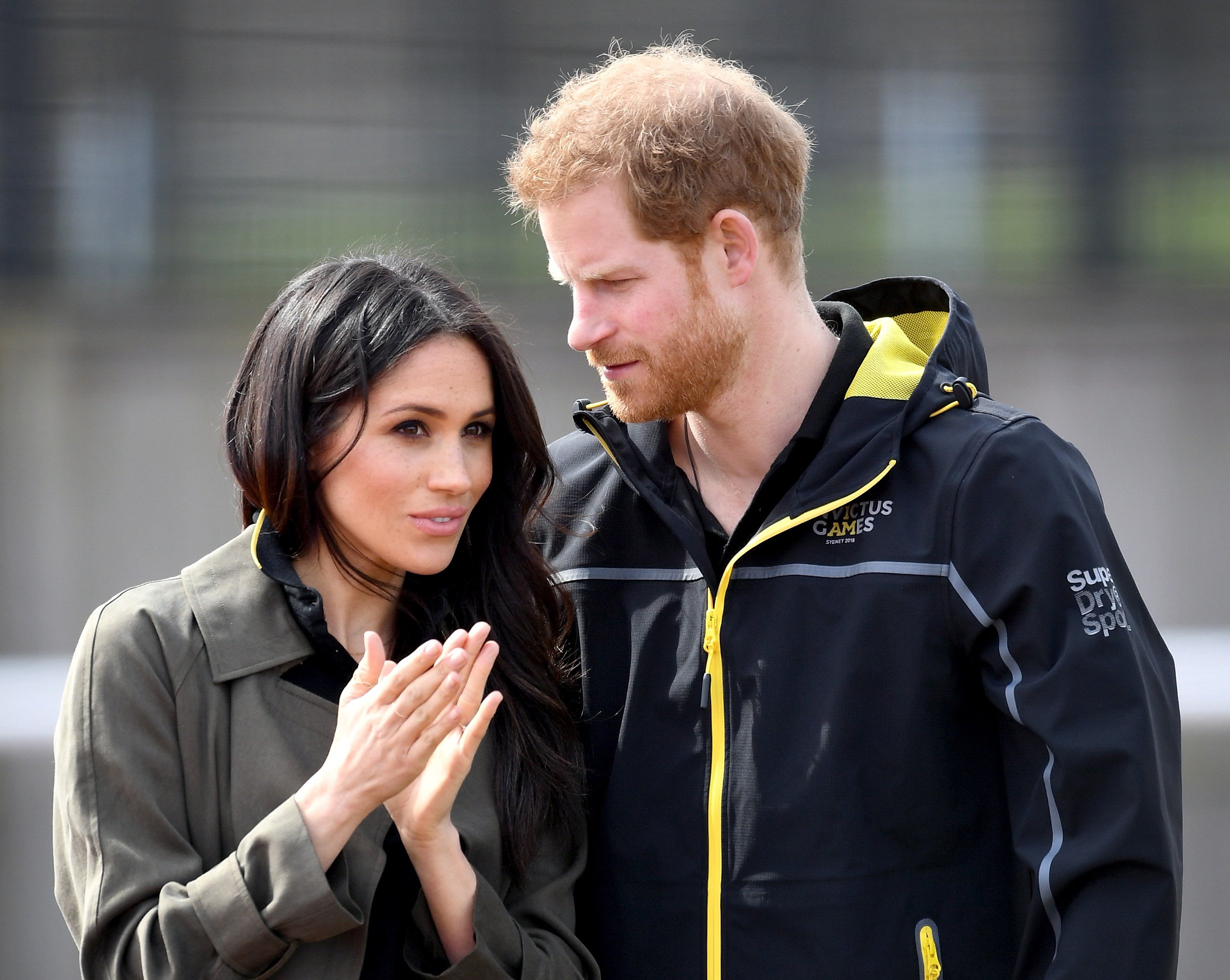 Meghan Markle (L) and Prince Harry, Patron of the Invictus Games Foundation attend the UK Team Trials for the Invictus Games Sydney | Source: Getty Images