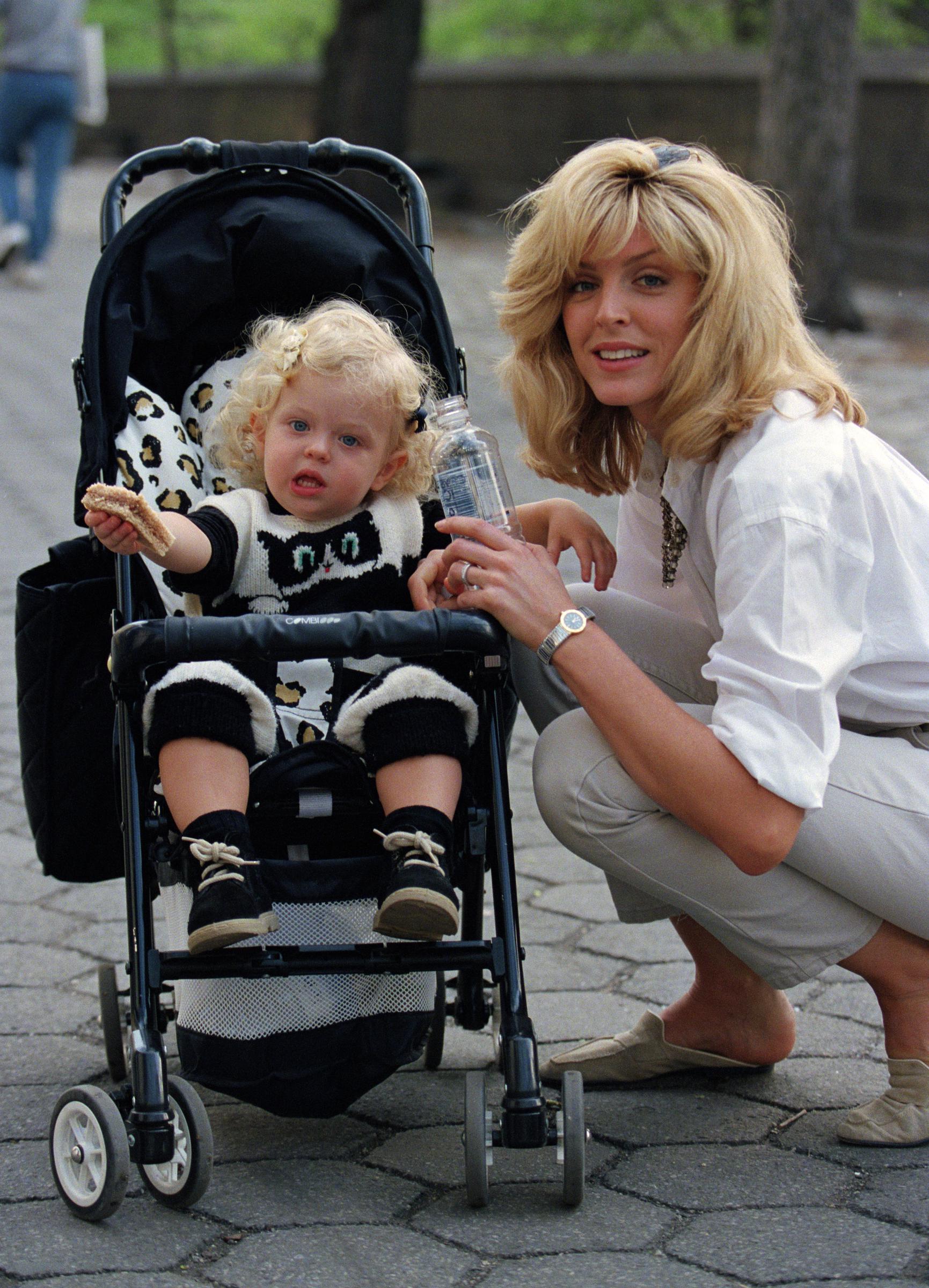 Marla Maples photographed with her daughter after a stroll in Central Park, New York, in 1995. | Source: Getty Images