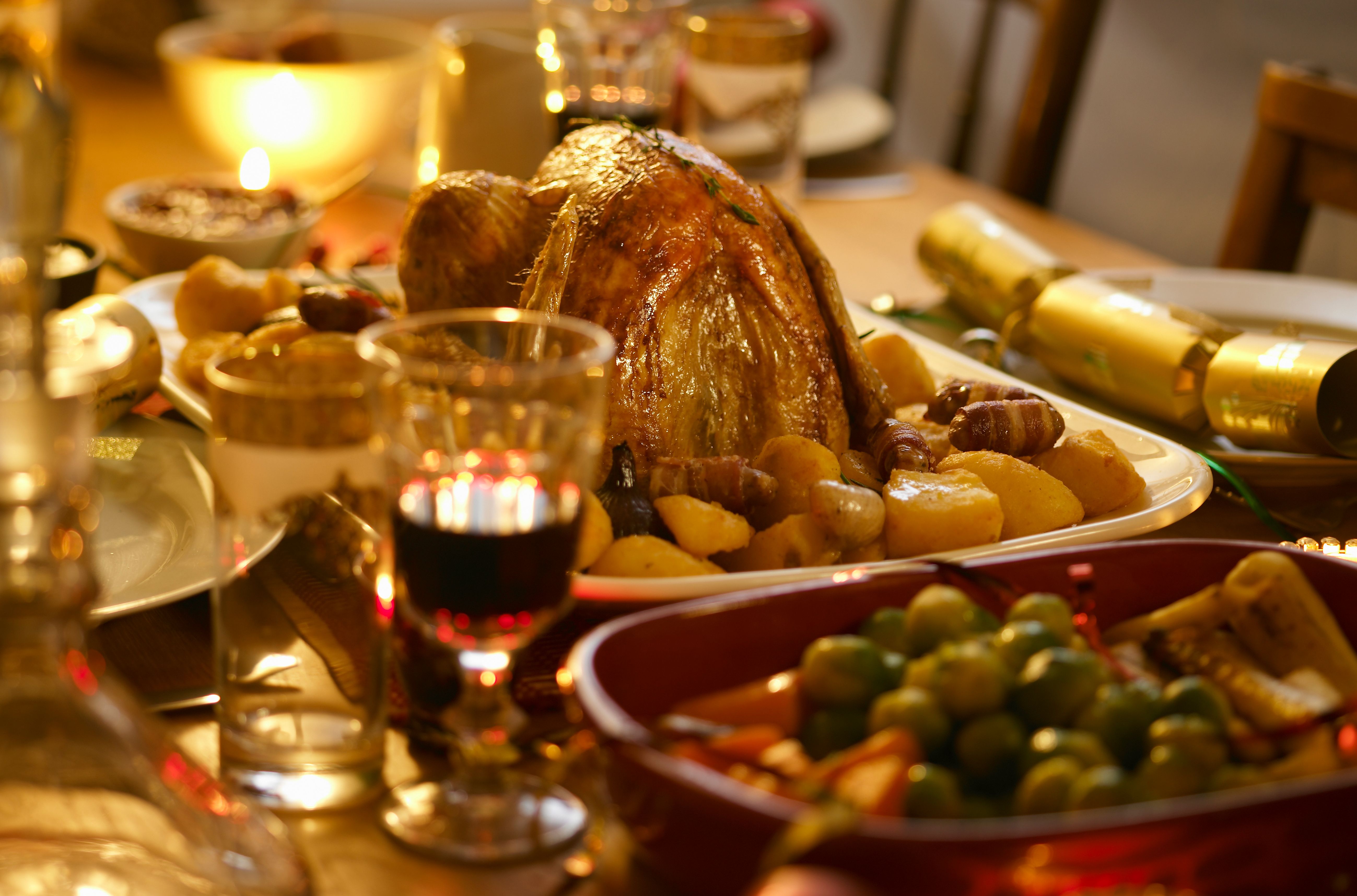 Roast turkey on a dinner table. | Source: Getty Images