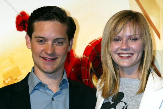 Kirsten Dunst, Tobey Maguire, "Spider-Man" Movie-Promotion in Japan, 2002 | Quelle: Getty Images