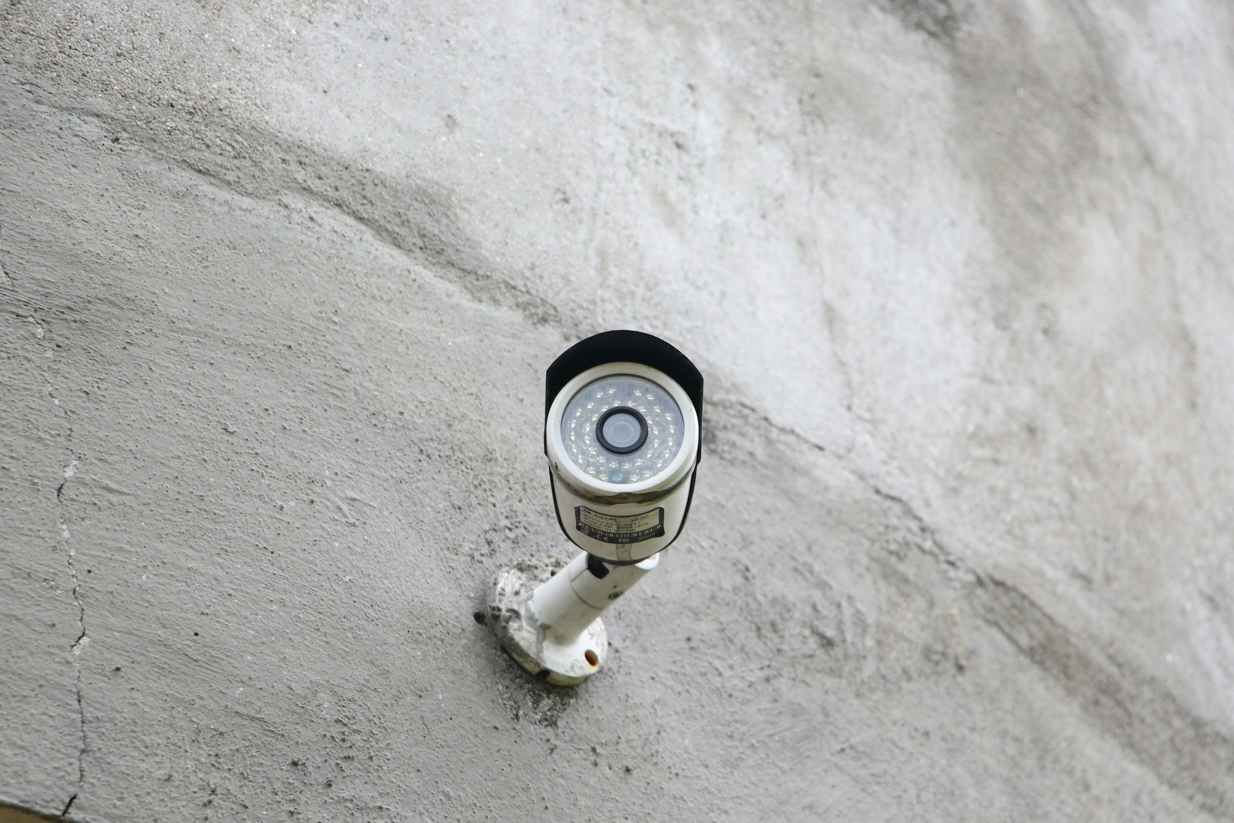 Close-up view of a CCTV camera | Source: Unsplash