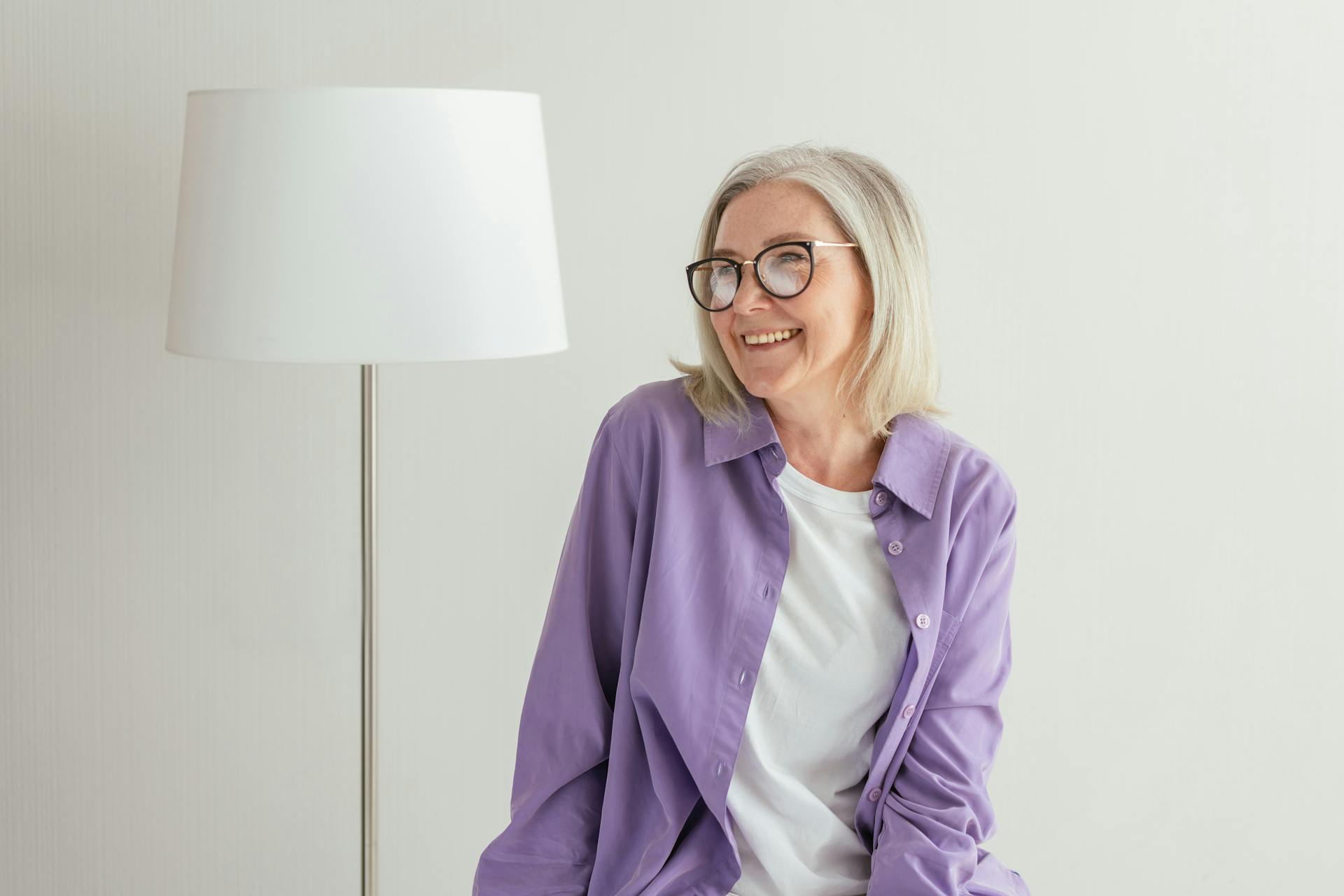 A cheerful senior woman smiling | Source: Pexels