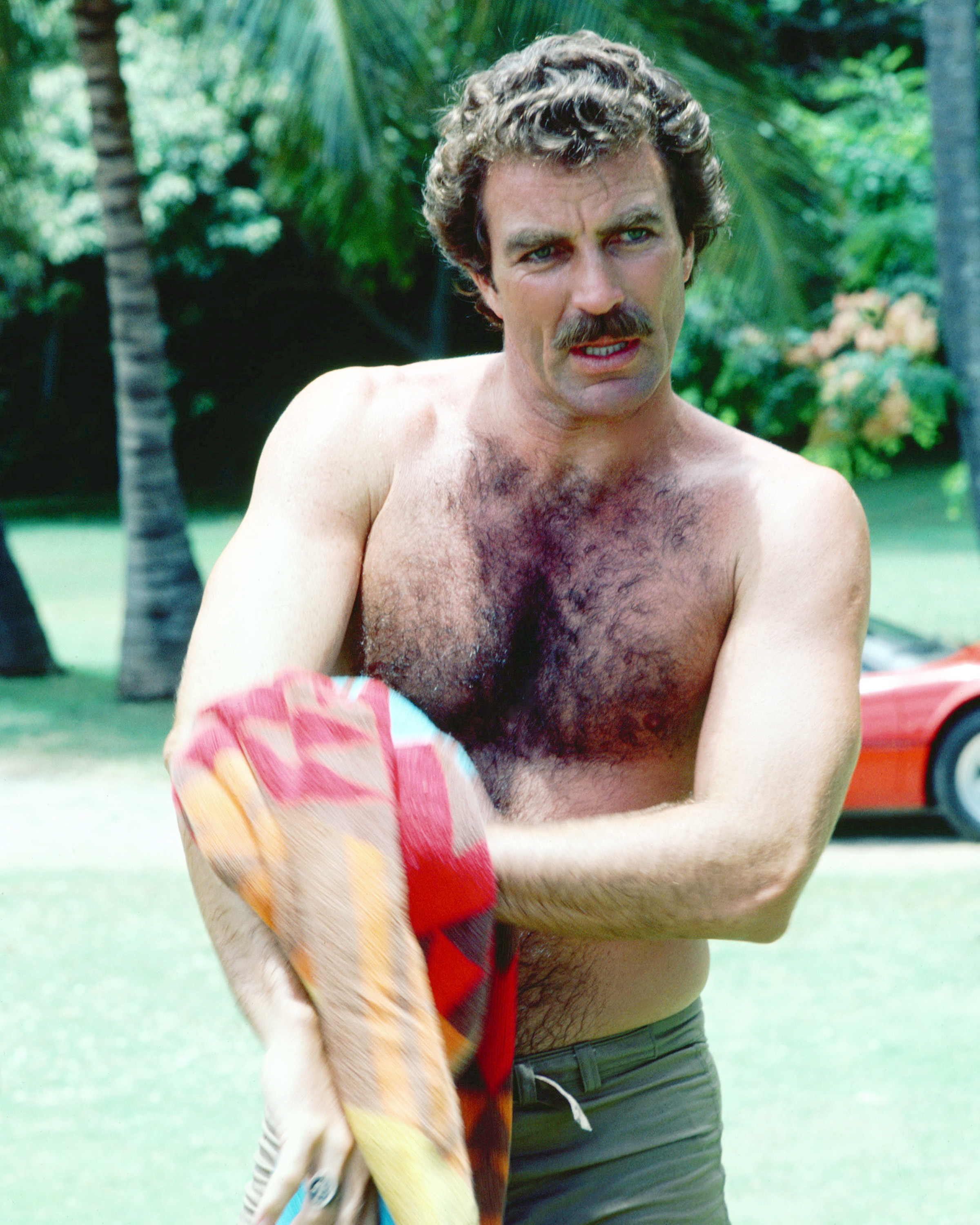 Tom Selleck as the titular investigator in the television series 'Magnum, P.I.', circa 1985 | Source: Getty Images