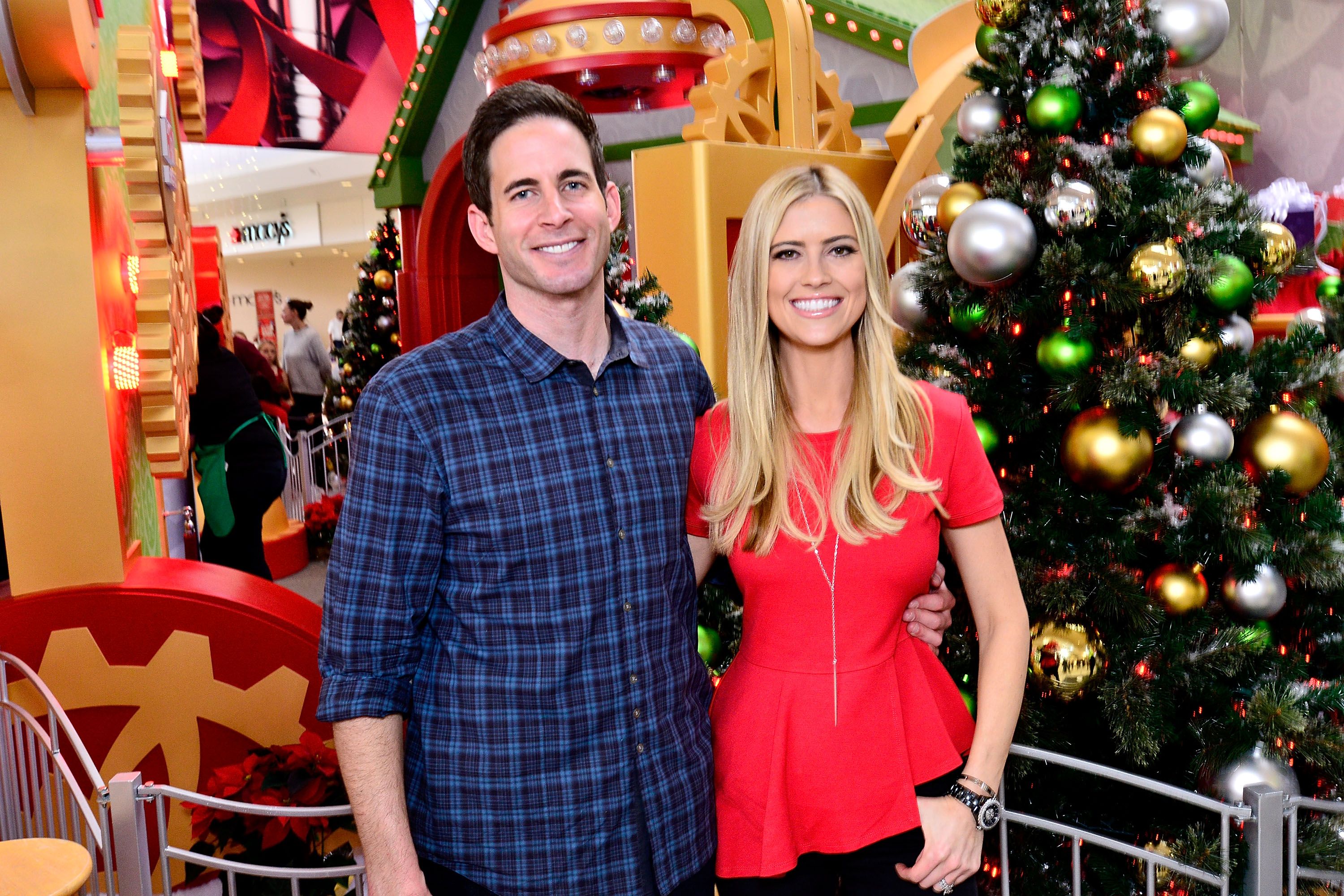 Tarek and Christina El Moussa, hosts of HGTV's hit show Flip or Flop, visited the HGTV Santa HQ at Lakewood Center on December 13, 2014 in Lakewood, California. | Source: Getty Images