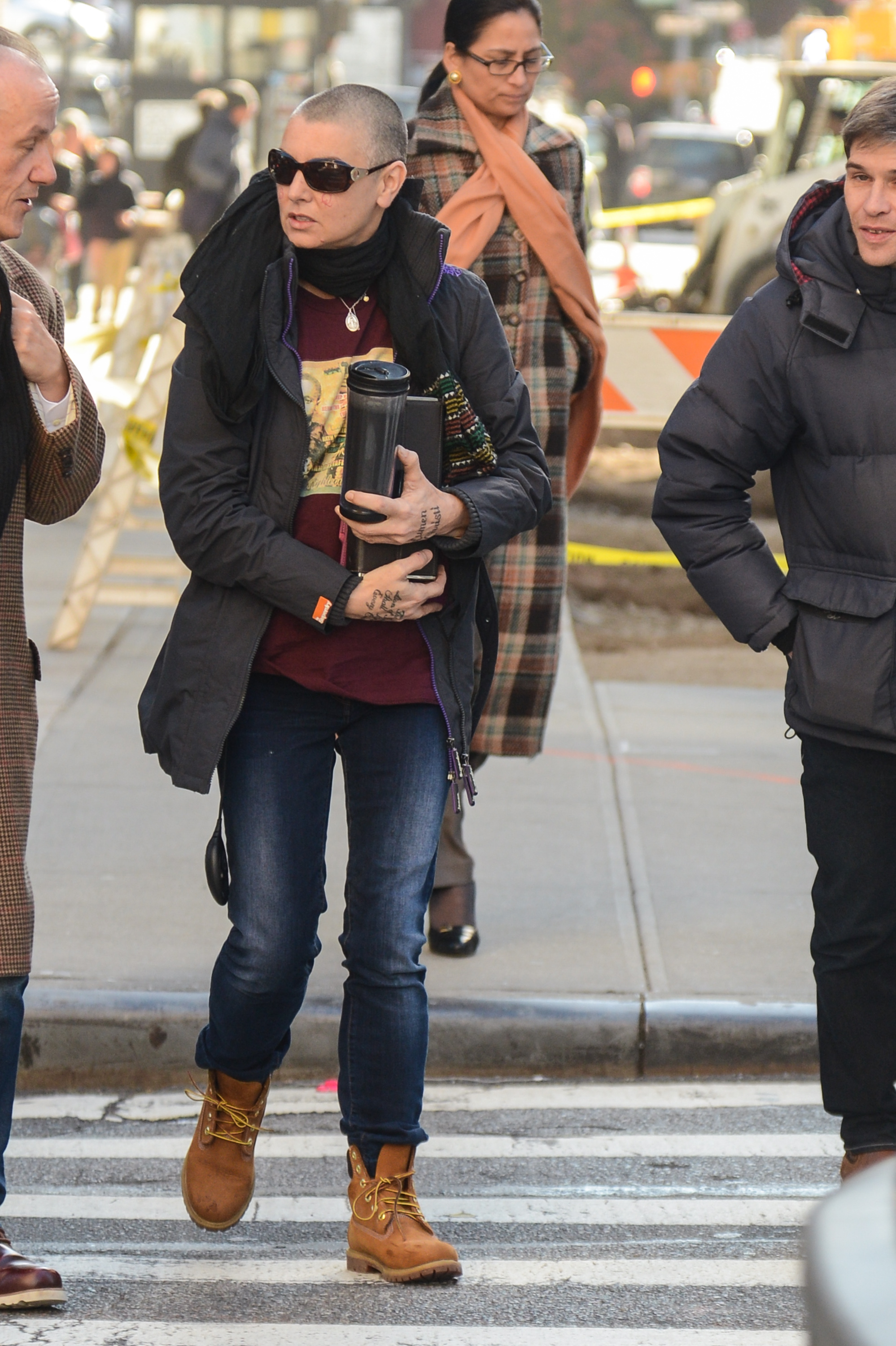 Singer Sinead O'Connor leaves her Soho hotel on November 11, 2013, in New York City | Source: Getty Images