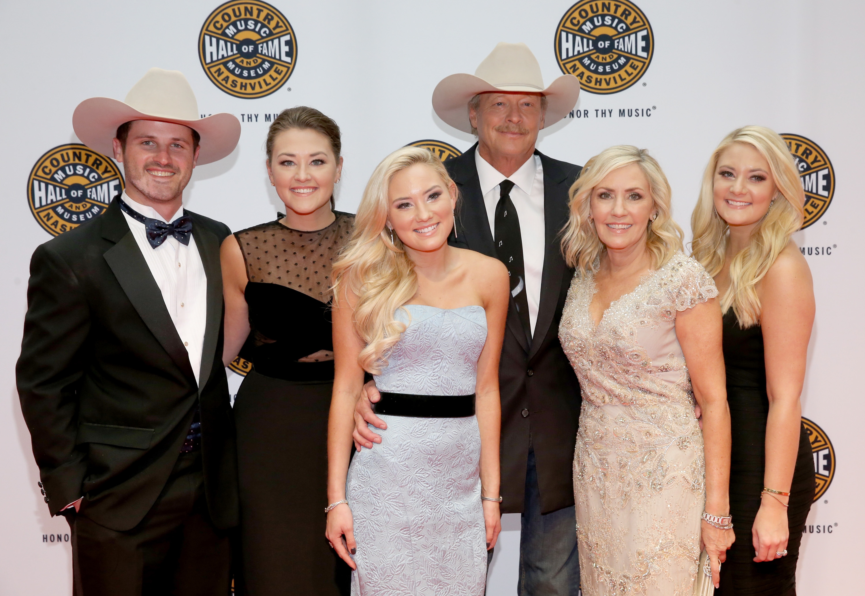 Alan Jackson, Ben Selecman, Mattie Jackson, Dani Jackson, Denise Jackson, and Alexandra Jackson at the Country Music Hall of Fame and Museum Medallion Ceremony at Country Music Hall of Fame and Museum in Nashville, Tennessee, on October 22, 2017. | Source: Getty Images