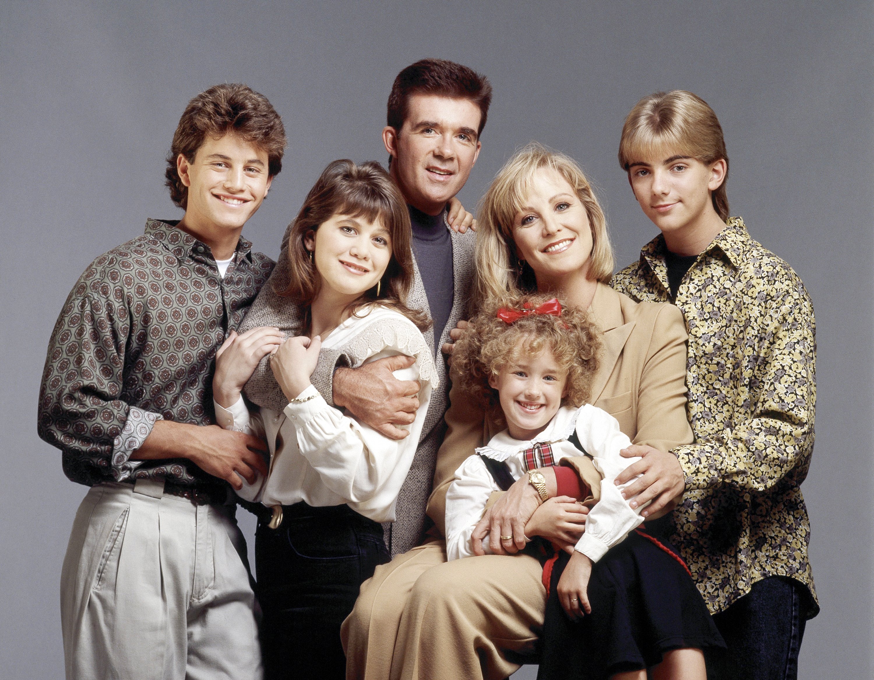 Kirk Cameron, Tracey Gold, Alan Thicke, Ashley Johnson , Joanna Kerns, Jeremy Miller in a "Growing Pains" cast photo in 1990.  | Source: Getty Images/ABC Photo Archives/Disney General Entertainment Content 