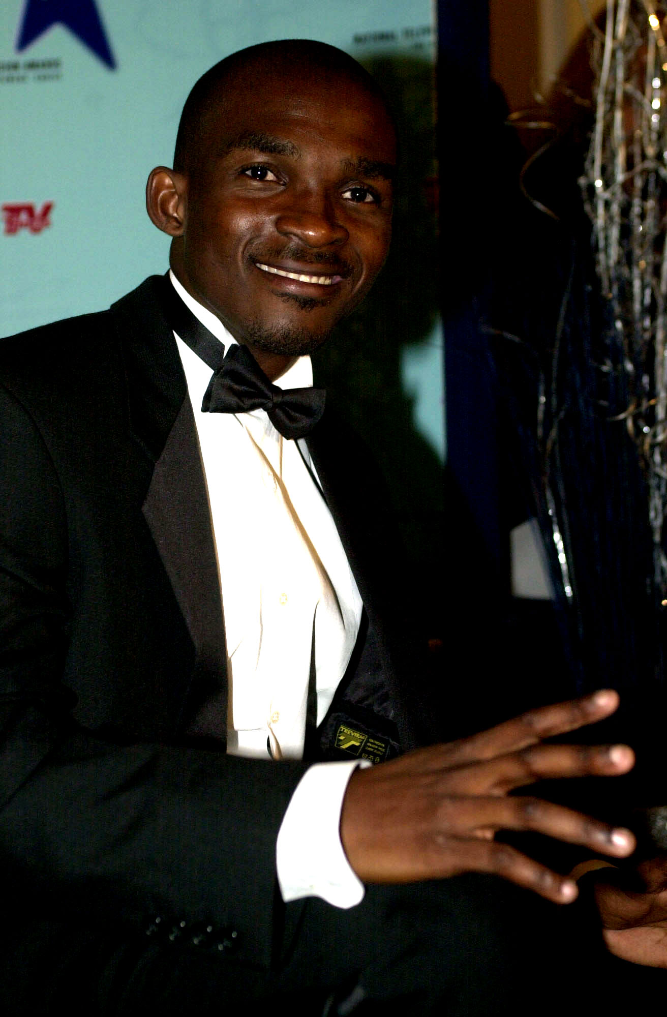 Eric "the Eel" Moussambani at the National Television Awards in London on October 10, 2000 | Source: Getty Images