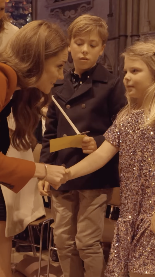 Catherine, Princess of Wales, greeting a child during her "Together at Christmas" carol concert. | Source: Instagram/princeandprincessofwales/ ITV