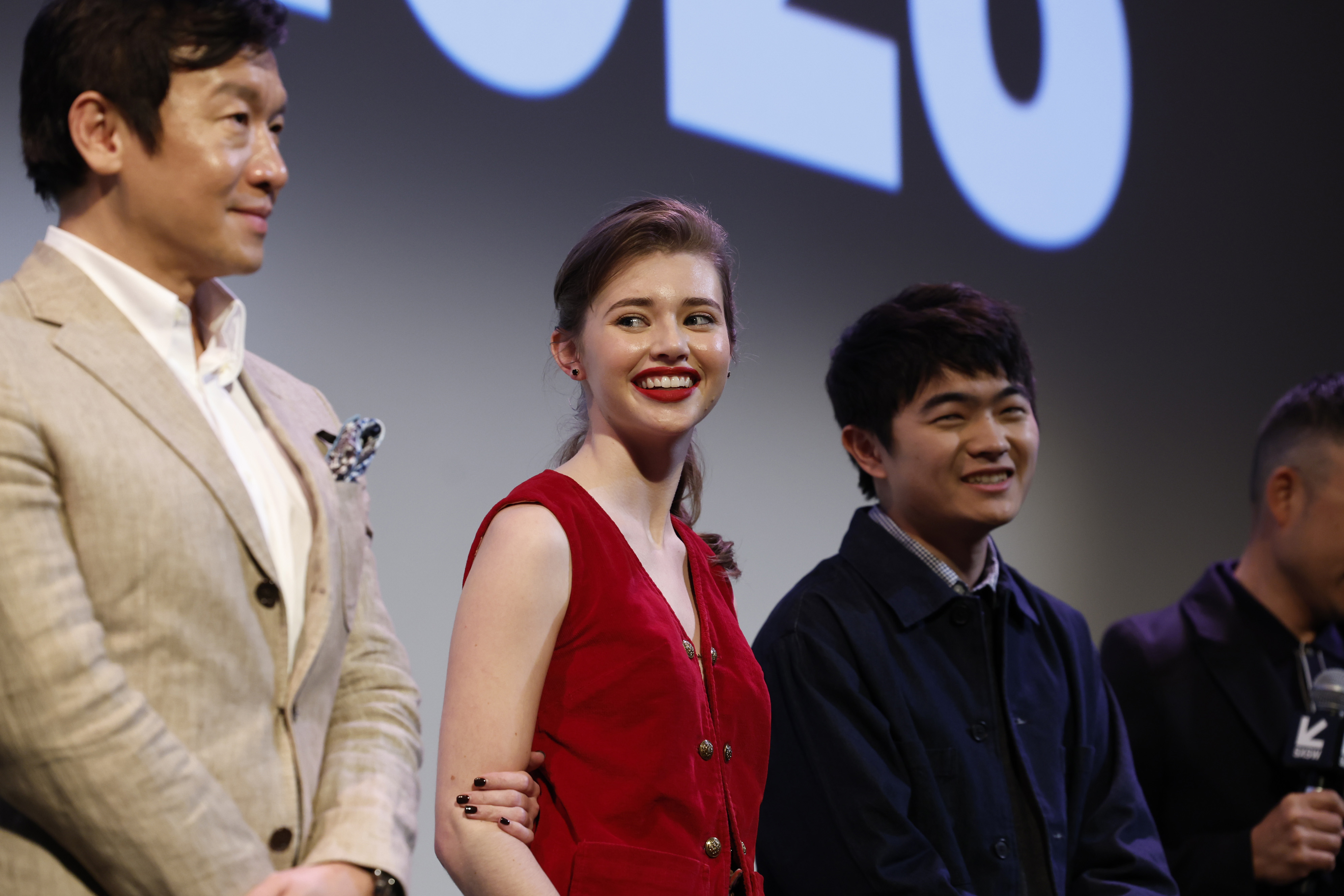 Chin Han, Sydney Taylor, Ben Wang are pictured at the Q+A of "American Born Chinese" World Premiere at the 2023 SXSW Conference and Festivals at The Paramount Theatre on March 15, 2023, in Austin, Texas | Source: Getty Images