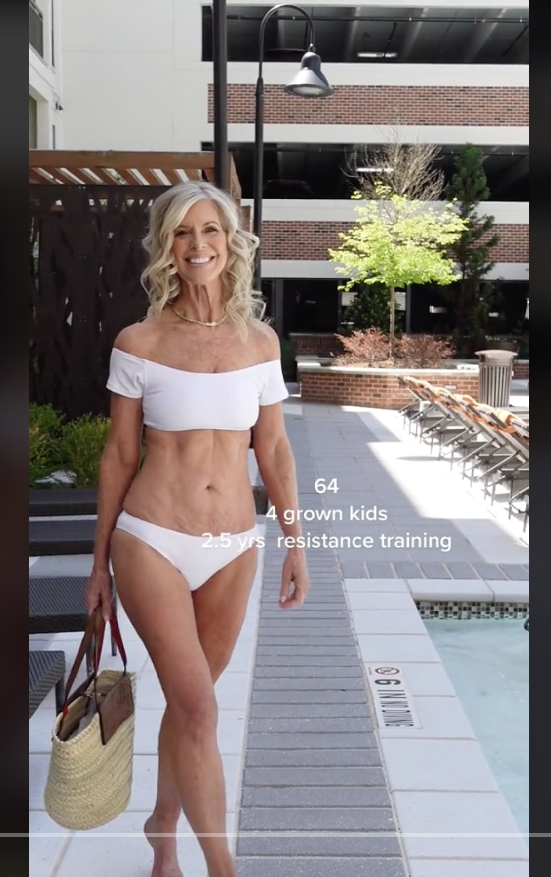 Harrah Brown wearing a white bikini in a video dated April 23, 2023 | Source: tiktok.com/@harrahbrown