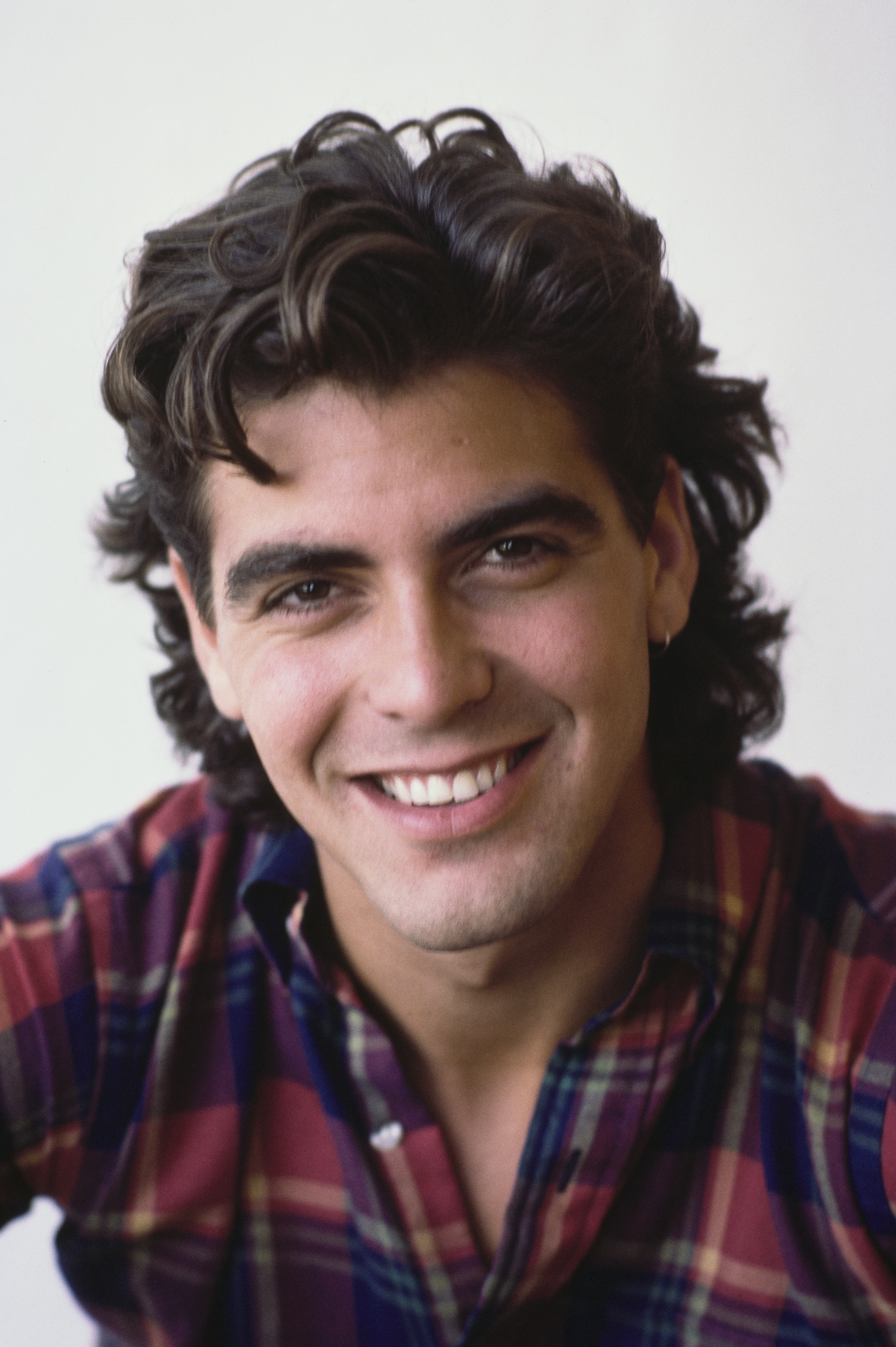 George Clooney participating in a portrait session in sunny Los Angeles, California in May 1985 | Source: Getty Images