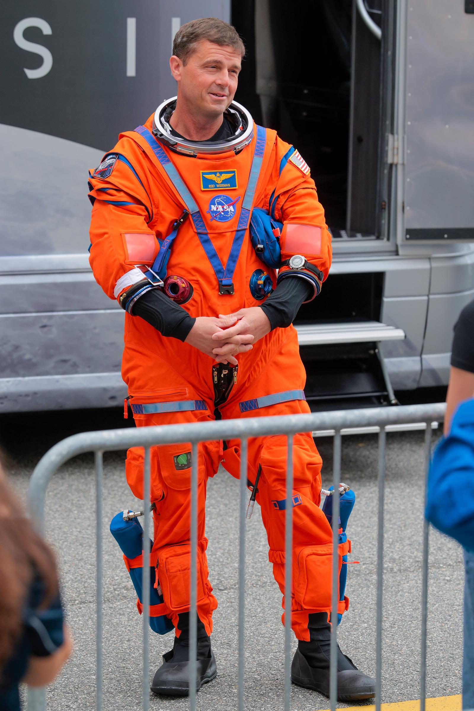 Commander Reid Wiseman speaks to his family as he walks out of the Neil A. Armstrong Operations and Checkout Building ahead of the launch of the Artemis II at NASA&rsquo;s Kennedy Space Center on April 01, 2026 in Cape Canaveral, Florida. | Source: Getty Images