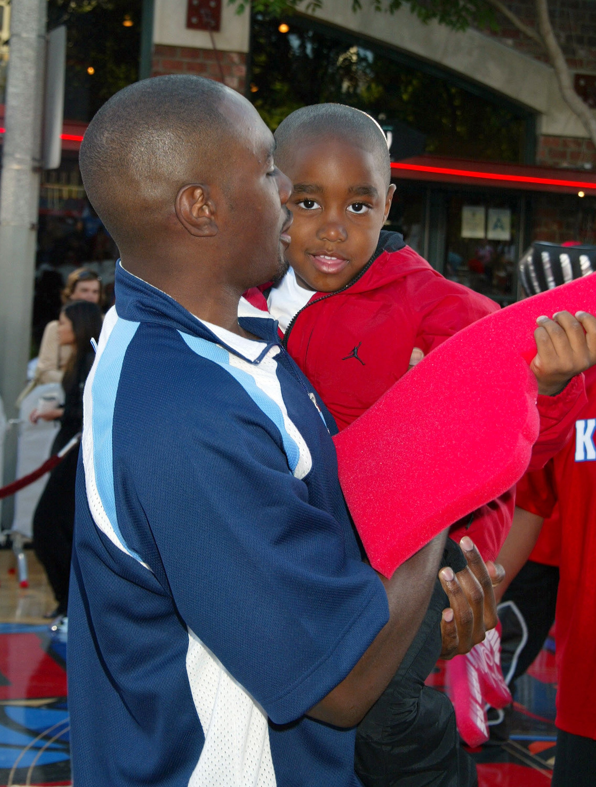 Morris Chestnut and his son, Grant, during the "Like Mike" premiere in Westwood, California, on June 27, 2002 | Source: Getty Images