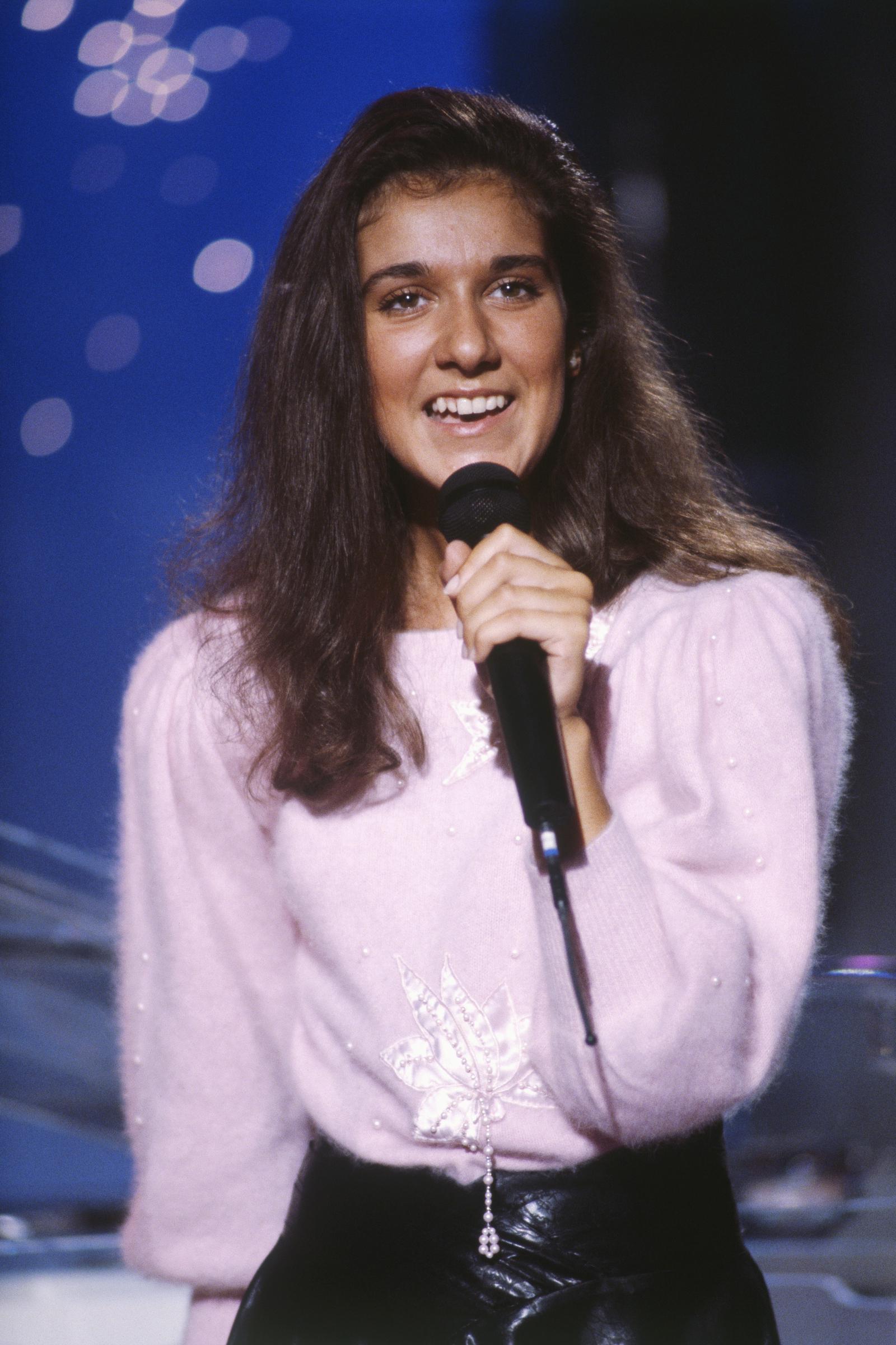 Céline Dion performing on the television show "Champs Elysees" in 1985. | Source: Getty Images