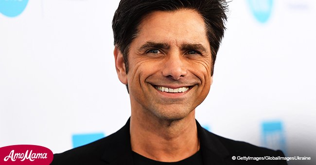 John Stamos posted a snap of him snuggling up to his baby boy