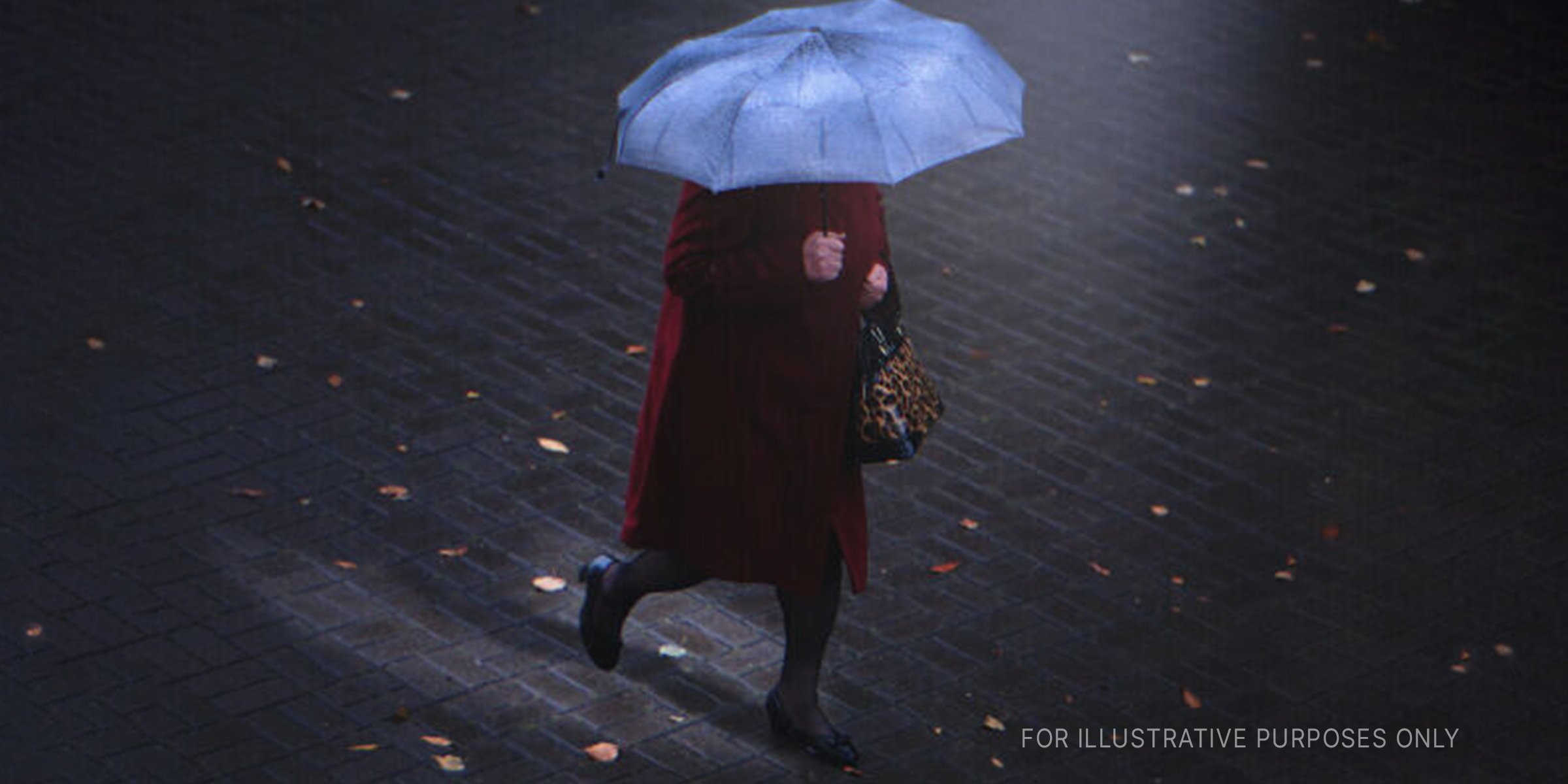 A woman walking on the street. | Source: Shutterstock