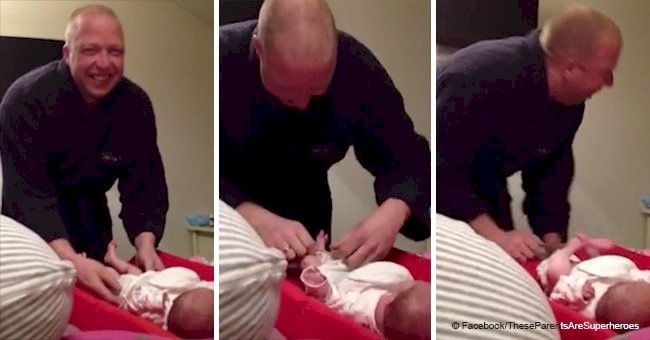 Wife hysterically laughs filming husband gag every time he touches newborn's dirty diapers