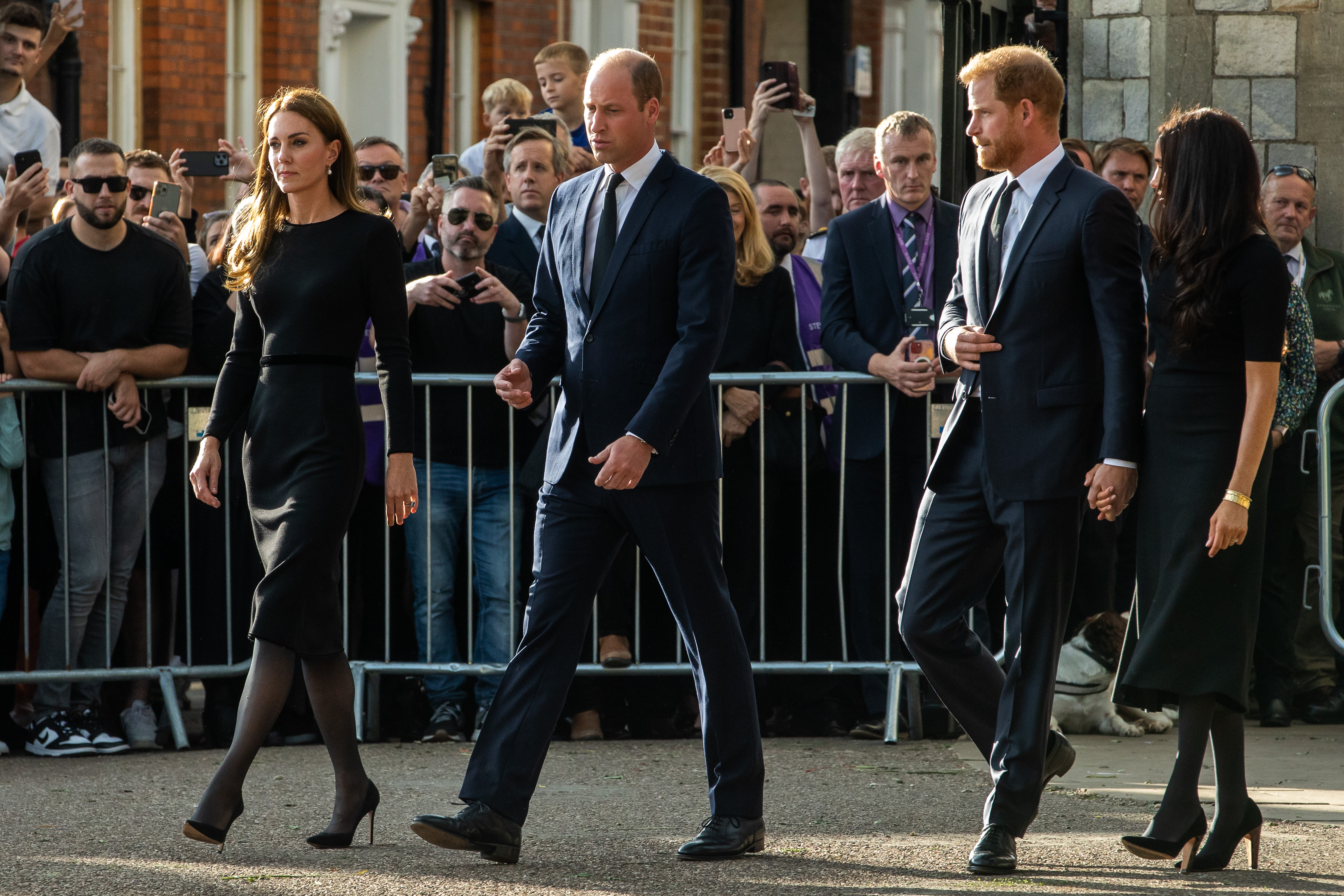 Prince William and Catherine, the new Prince and Princess of Wales, accompanied by Prince Harry and Meghan, the Duke and Duchess of Sussex, proceed to greet well-wishers outside Windsor Castle on 10th September 2022 in Windsor, United Kingdom. | Source: Getty Images
