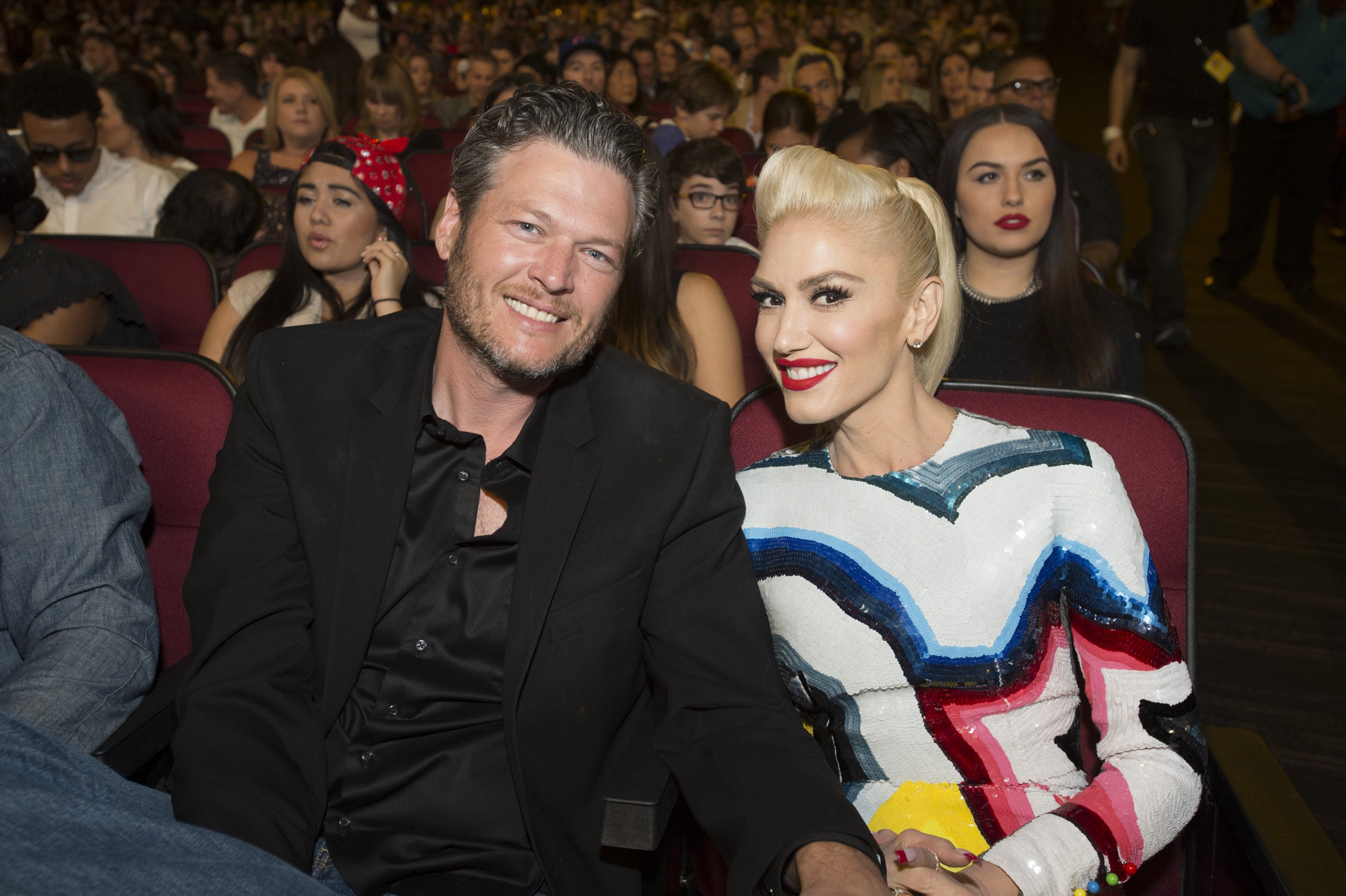Blake Shelton and Gwen Stefani looking cosy at The Disney Music Radio Awards held on 30 April, 2016. | Photo: Getty Images. 