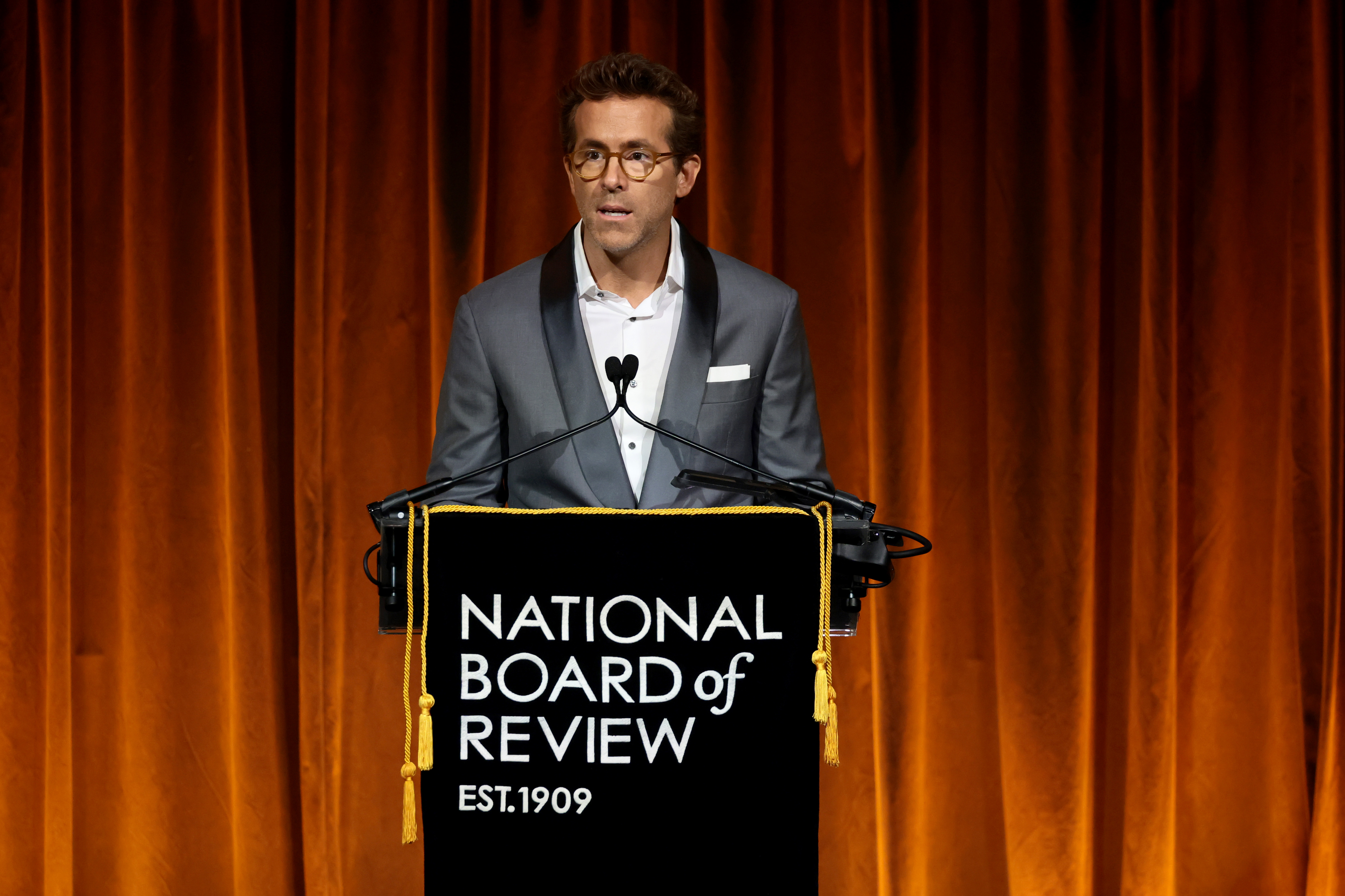 Ryan Reynolds speaks onstage during The National Board of Review Annual Awards Gala at Cipriani 42nd Street in New York City, on January 7, 2025 | Source: Getty Images