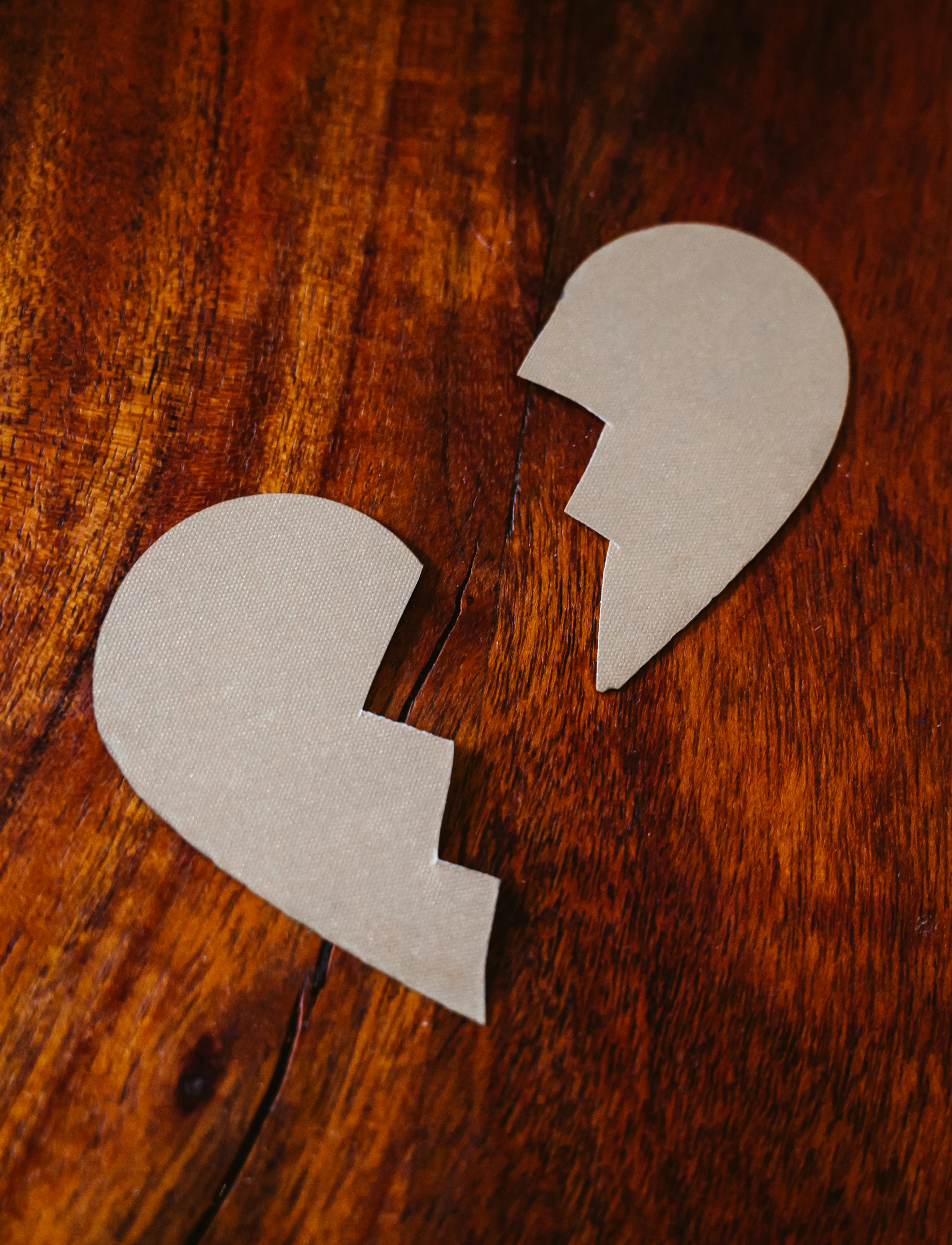 A white paper heart cut in two | Source: Pexels