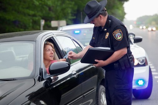 Female Driver and a Policeman | Photo: Getty Images