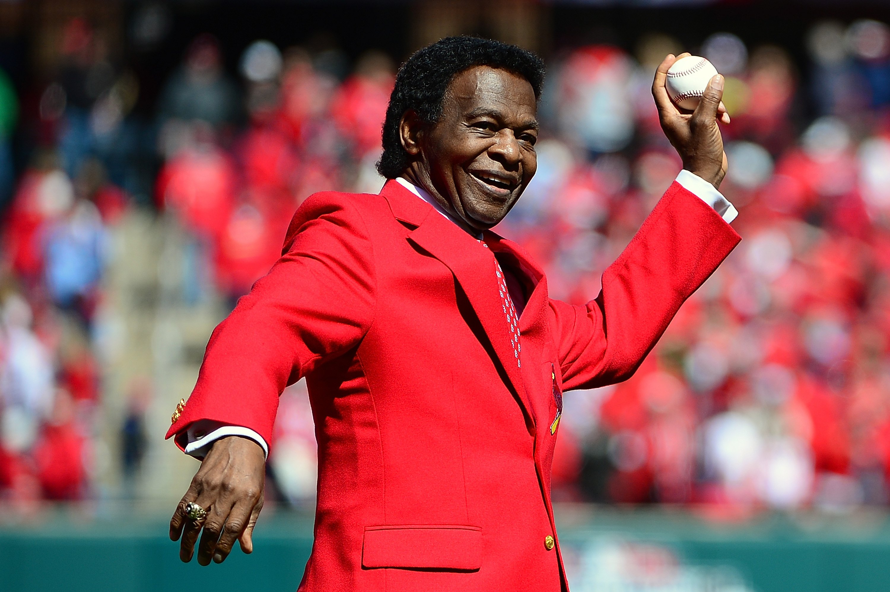 St. Louis Cardinals hall of famer Lou Brock throws out the first pitch at Busch Stadium on April 11, 2016 in St. Louis, Missouri. | Source: Getty Images