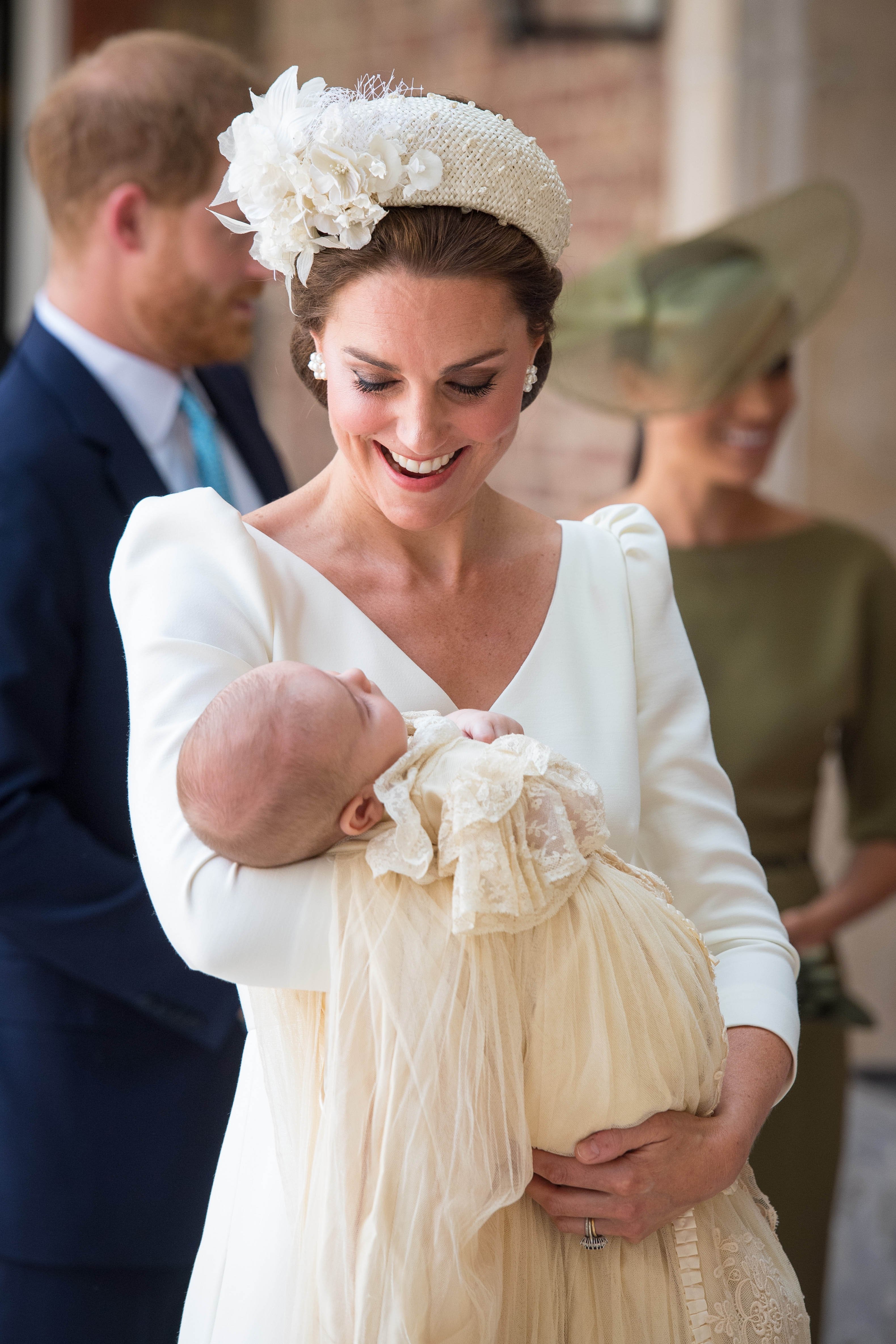 Kate Middleton holding Princess Charlotte | Photo: Getty Images