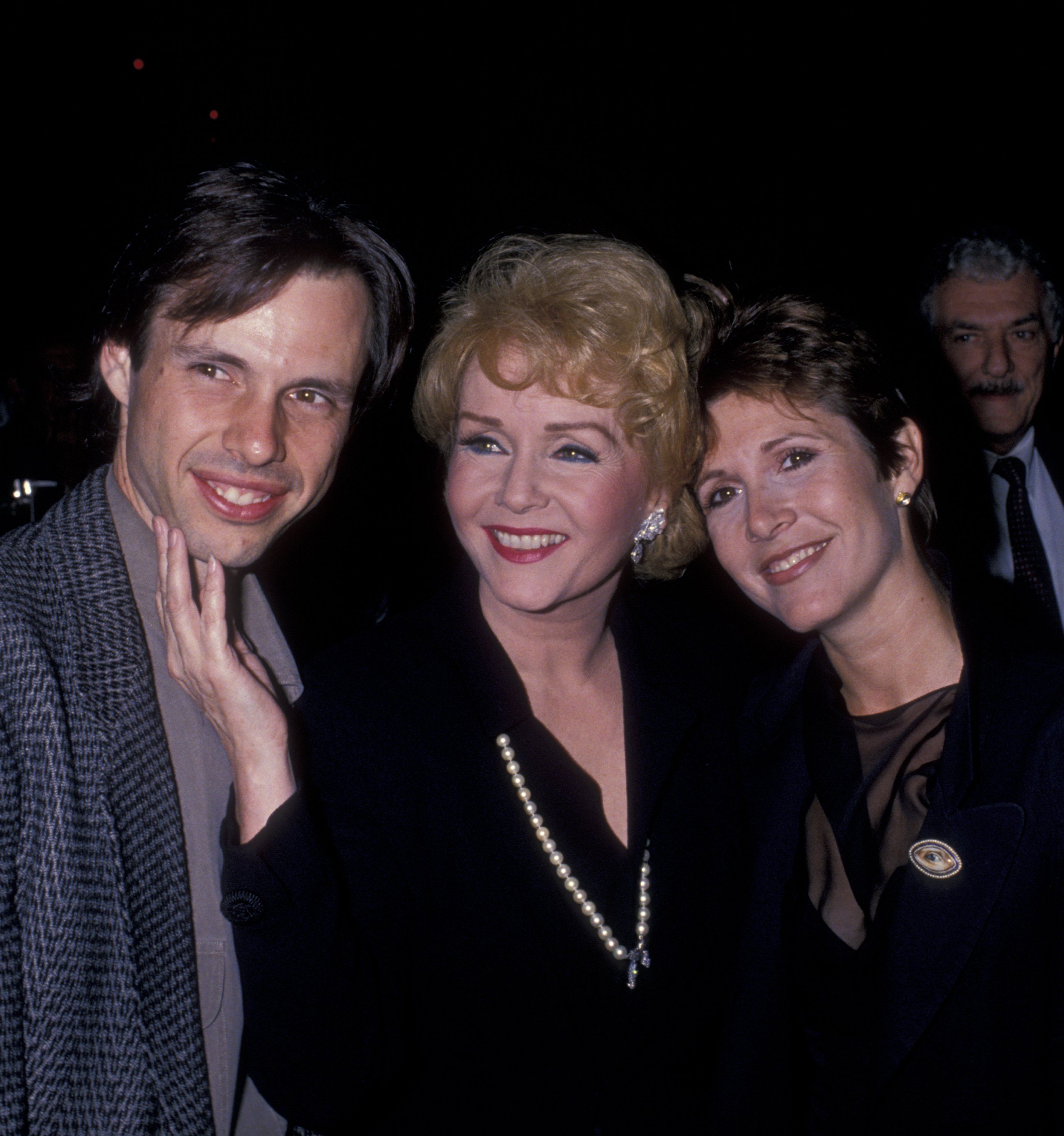 Todd Fisher, Debbie Reynolds and Carrie Fisher attend "The Unsinkable Molly Brown" Opening on September 19, 1989 at the Pantages Theater in Hollywood, California. | Source: Getty Images