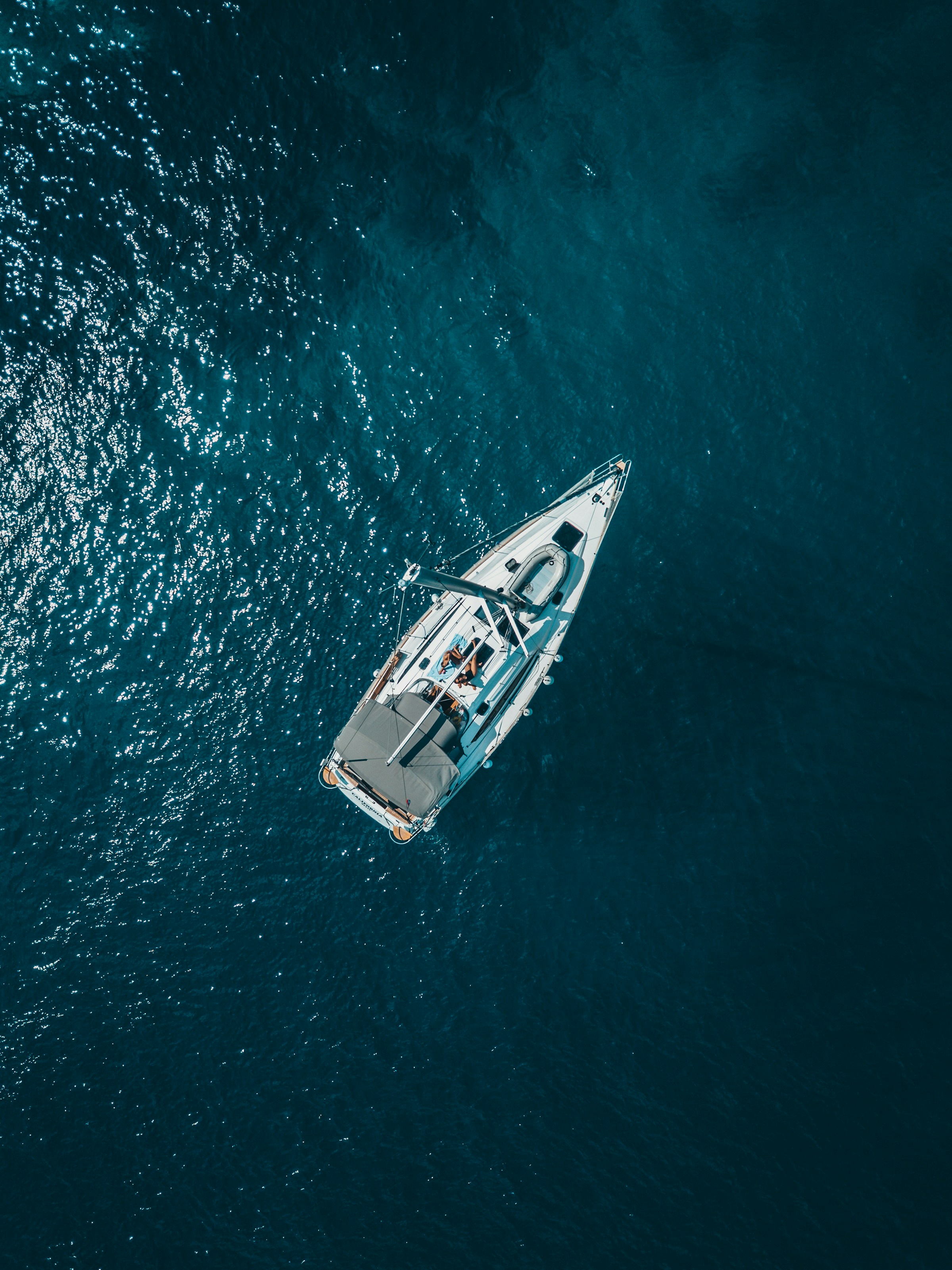 Aerial view of boat at sea | Source: Unsplash