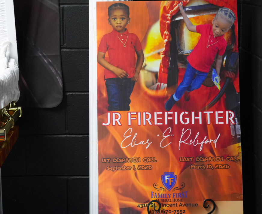 A poster with Elias Reliford's photos and his birth and death dates at his funeral, posted on April 4, 2026. | Source: Facebook/Fam First