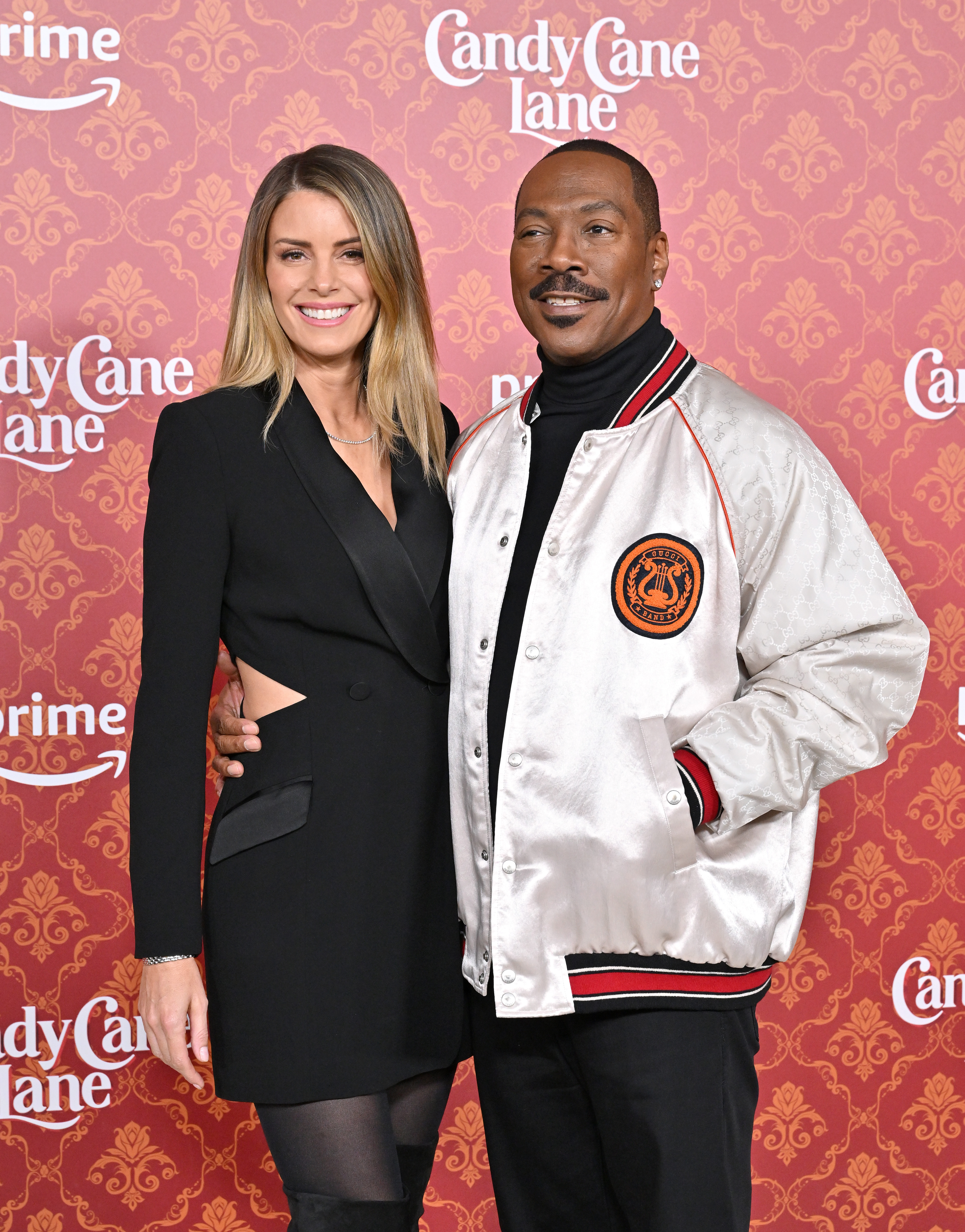 Paige Butcher and Eddie Murphy at the world premiere of "Candy Cane Lane" in Los Angeles, California on November 28, 2023 | Source: Getty Images