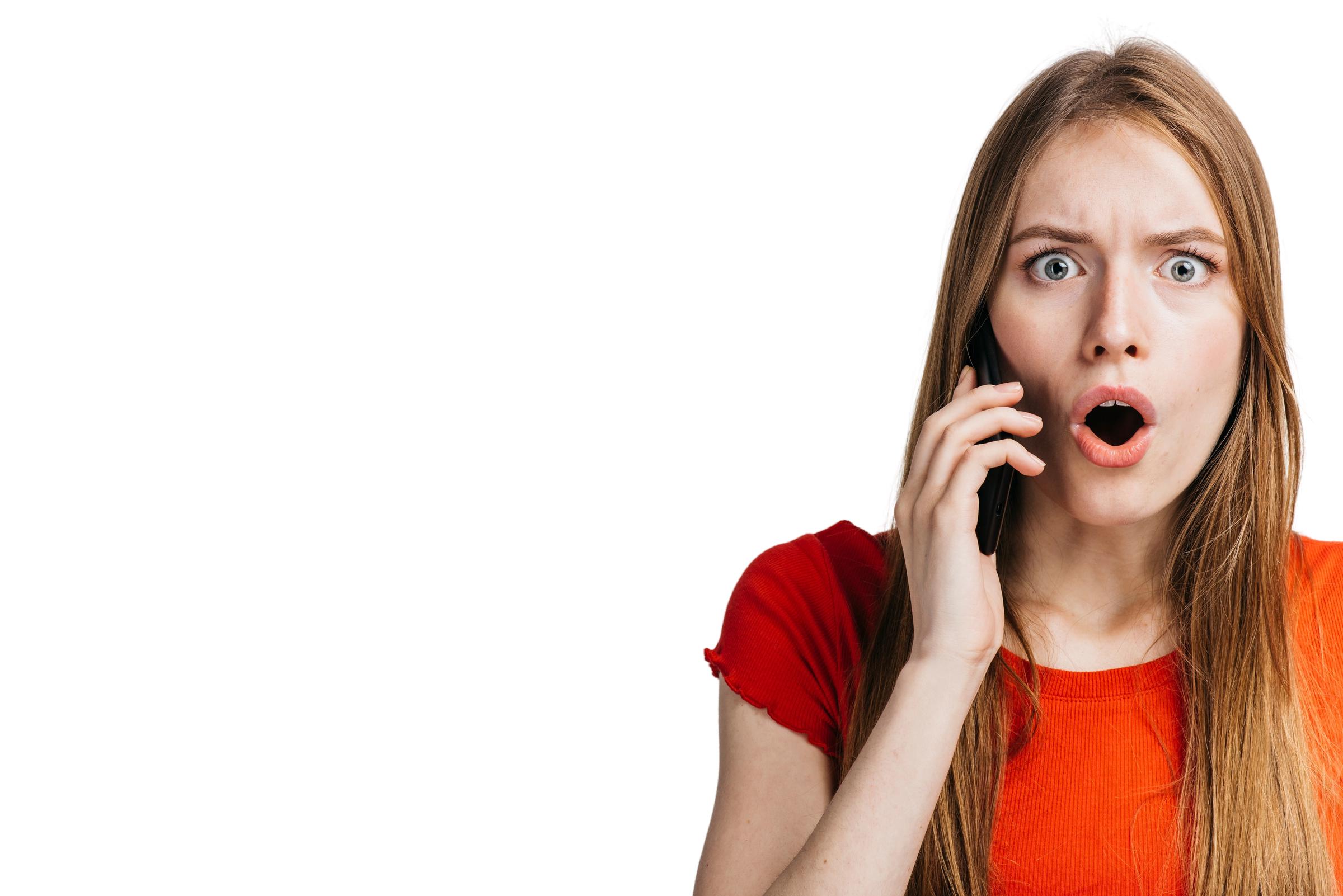 A furious woman yelling on the phone | Source: Freepik