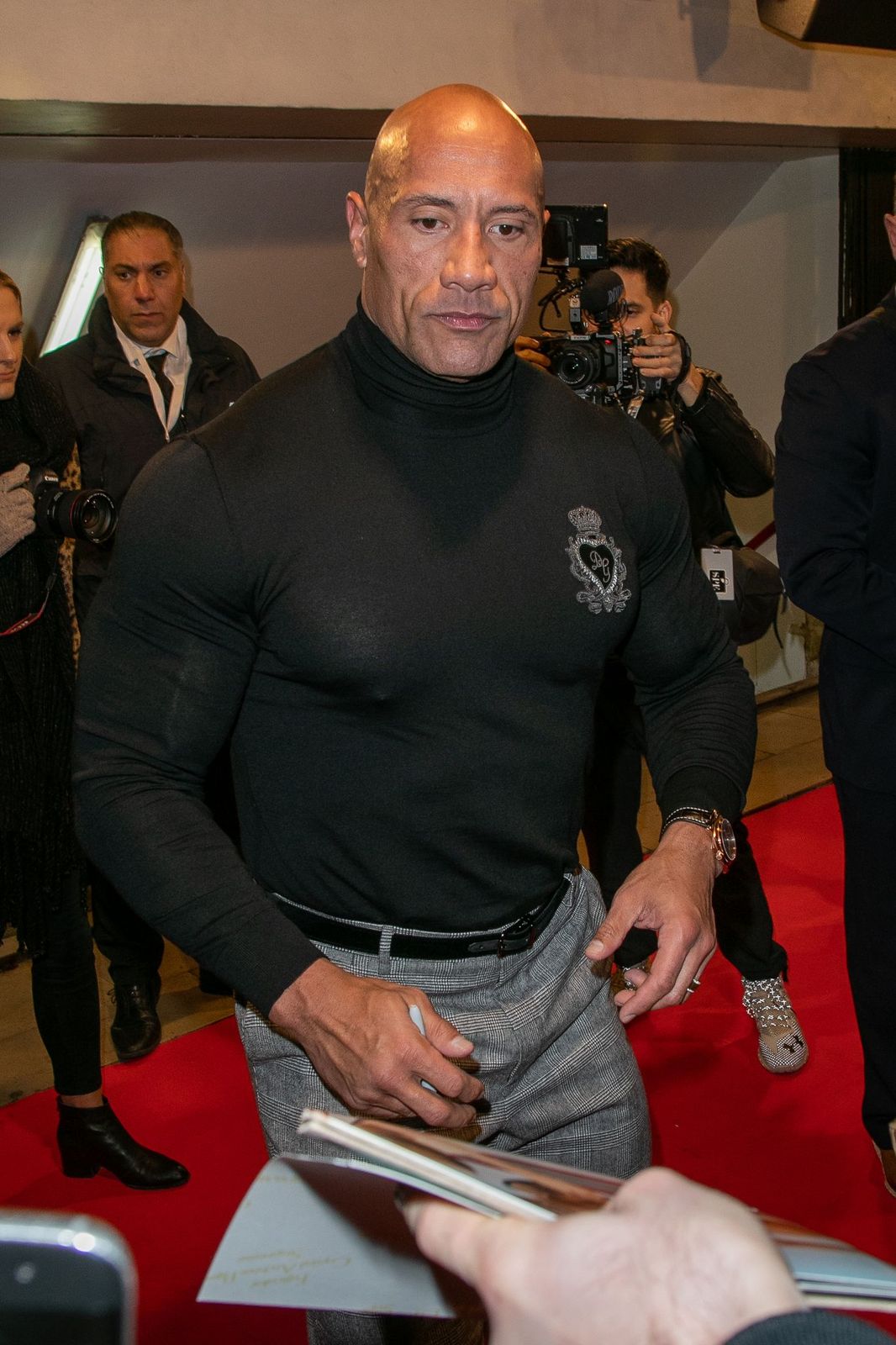 Dwayne Johnson at the "Jumanji; next level" Paris Premiere on December 03, 2019, in France | Photo: Getty Images