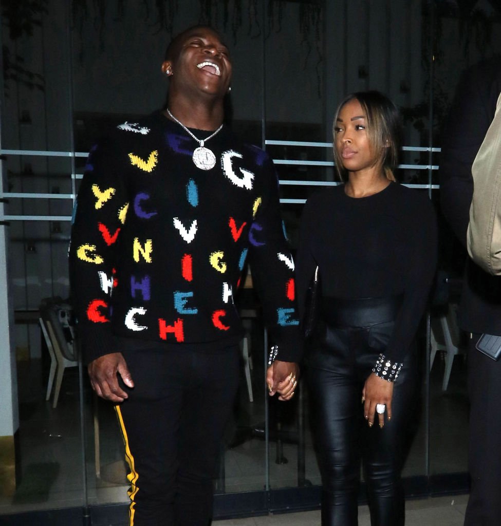 O.T. Genasis and Malika Haqq walk and in hand while engaged in a conversation on May 10, 2019, in Los Angeles, California. (Photo by Hollywood To You/Star Max/GC Images)