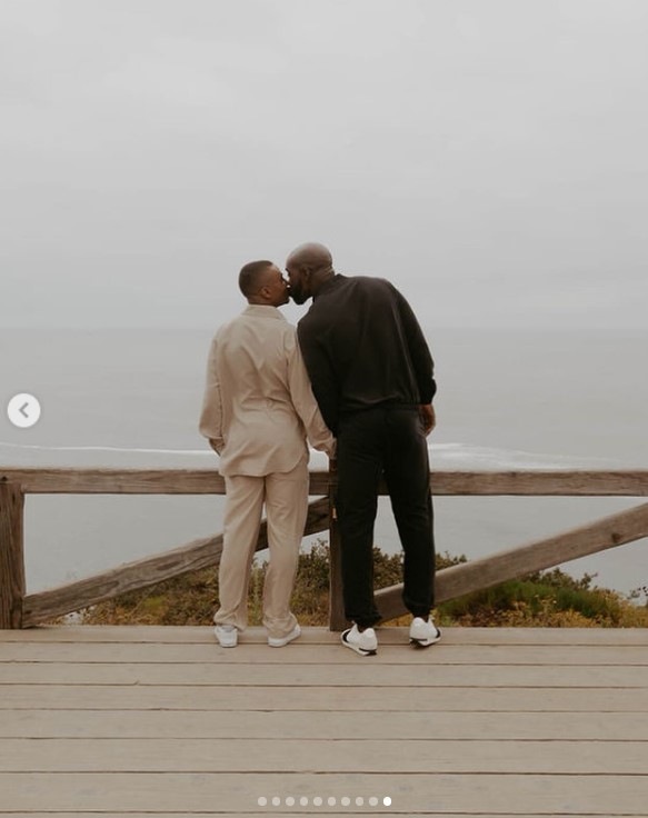 Greg Mathis Jr. and Elliott Cooper posing for their engagement announcement photoshoot in an image uploaded on July 19, 2024 | Source: Instagram/gregmathisjr