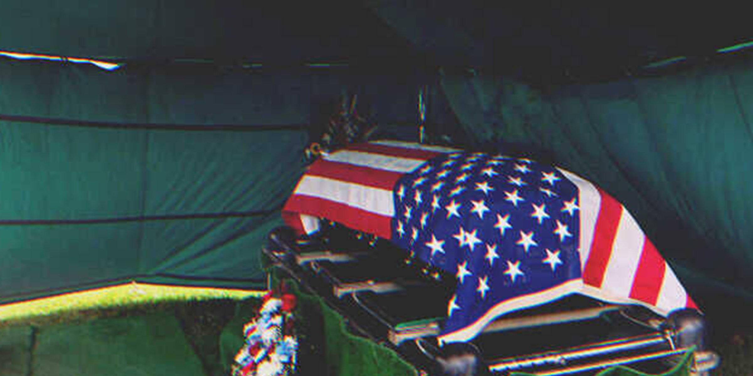 A coffin covered with a United States of America flag | Source: Getty Images